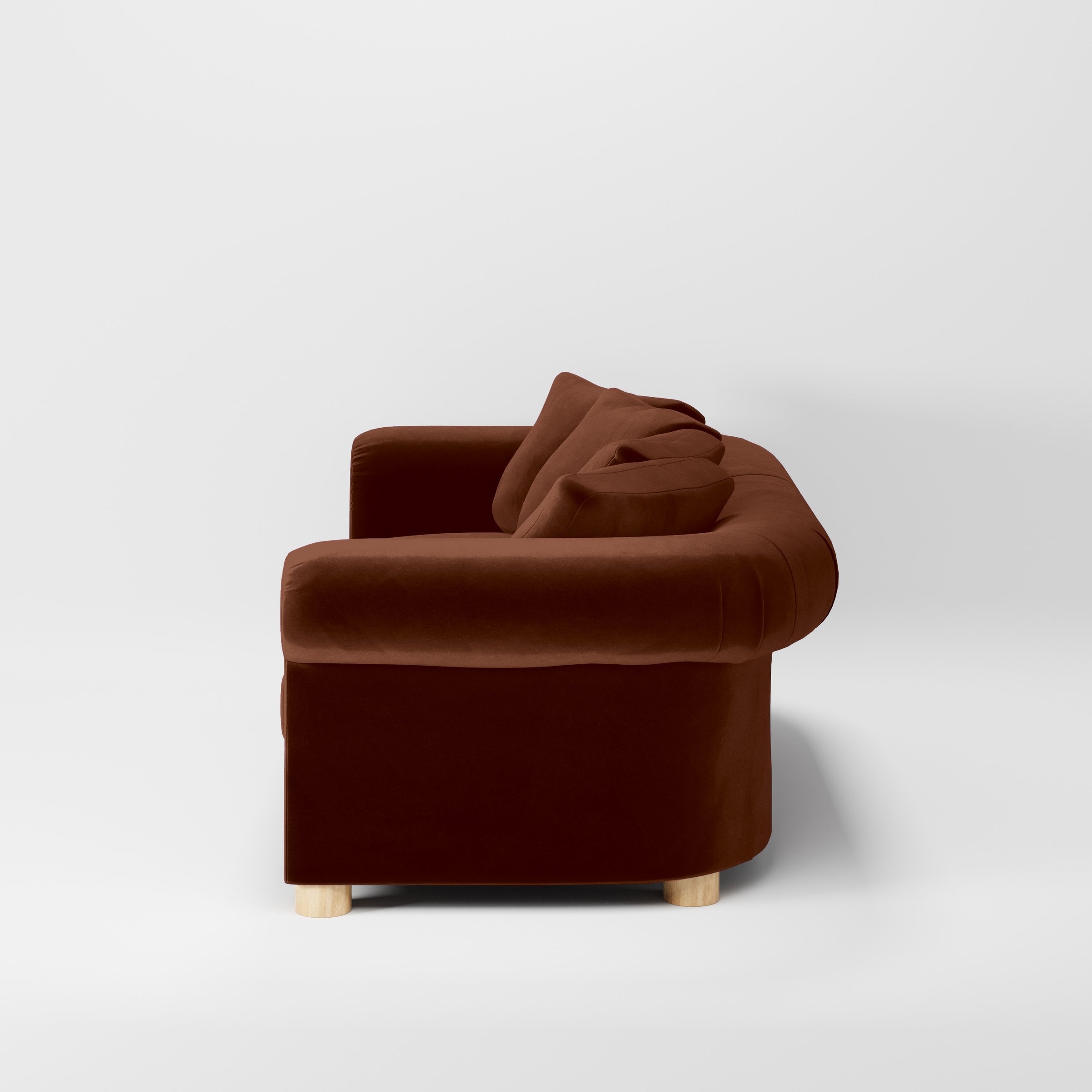 Side view of the Windermere sofa upholstered in Plush EasyClean Velvet in Maple.
