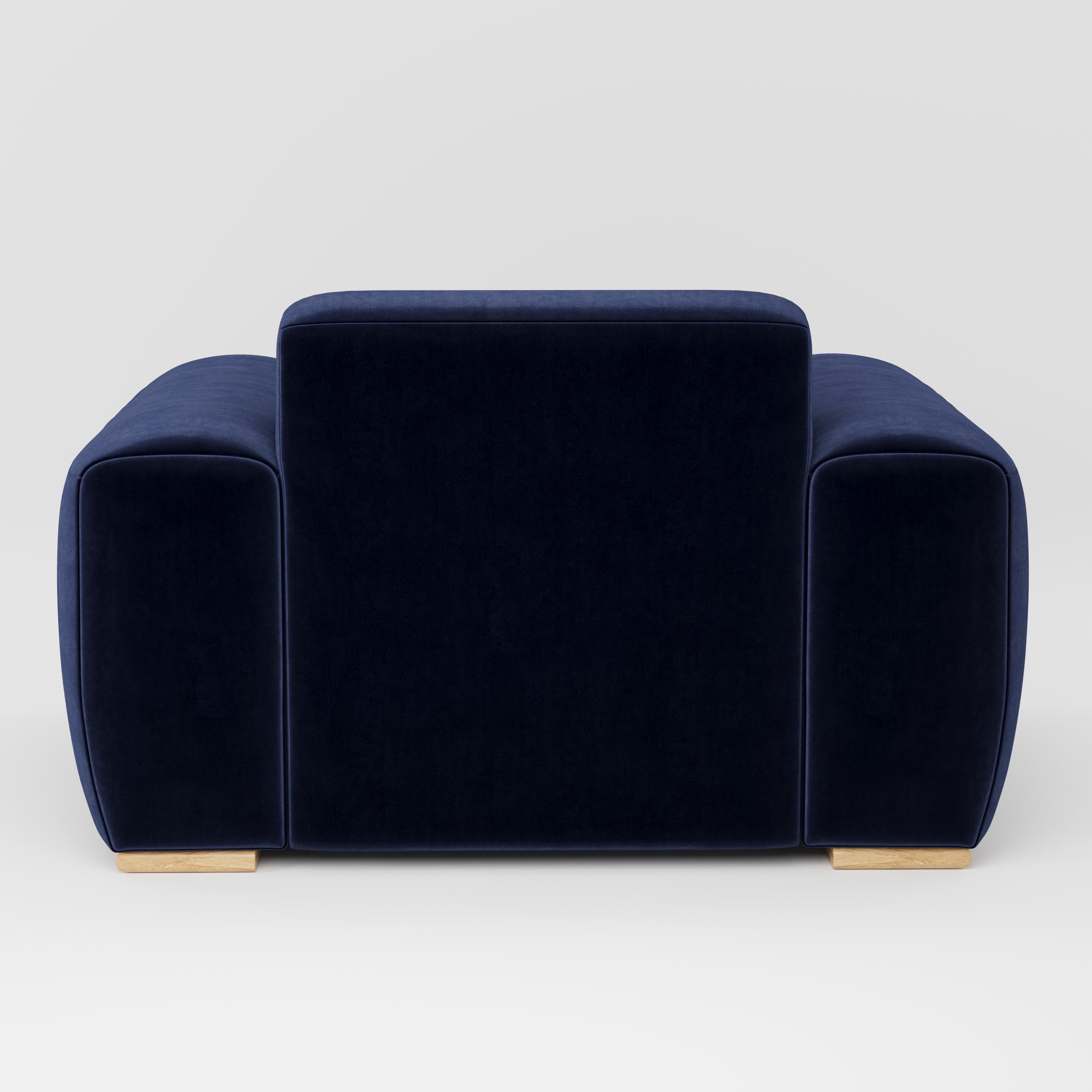 Darwell armchair in Noss Velvet Navy shown from the rear highlighting backrest shape and upholstery finish.