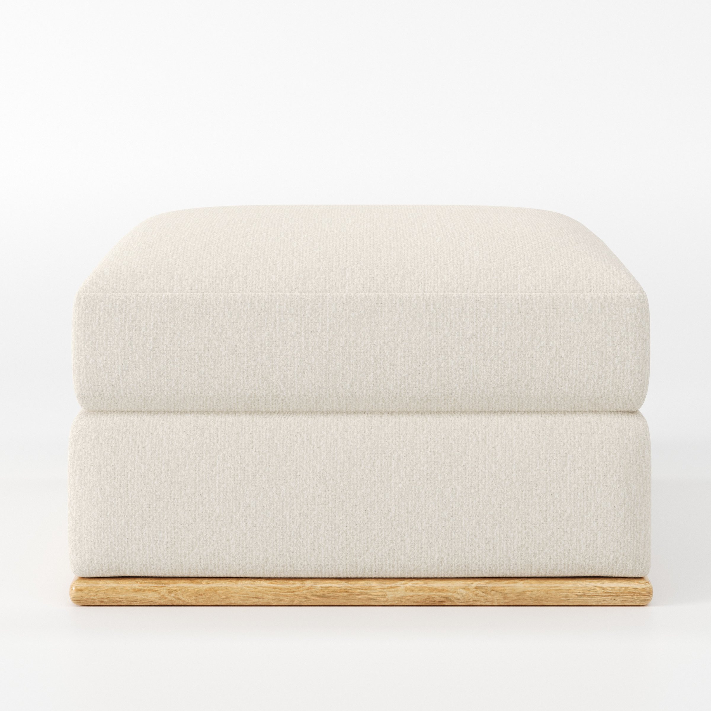 Cusher footstool in Kilda Boucle Cream shown front-on against a neutral studio backdrop.