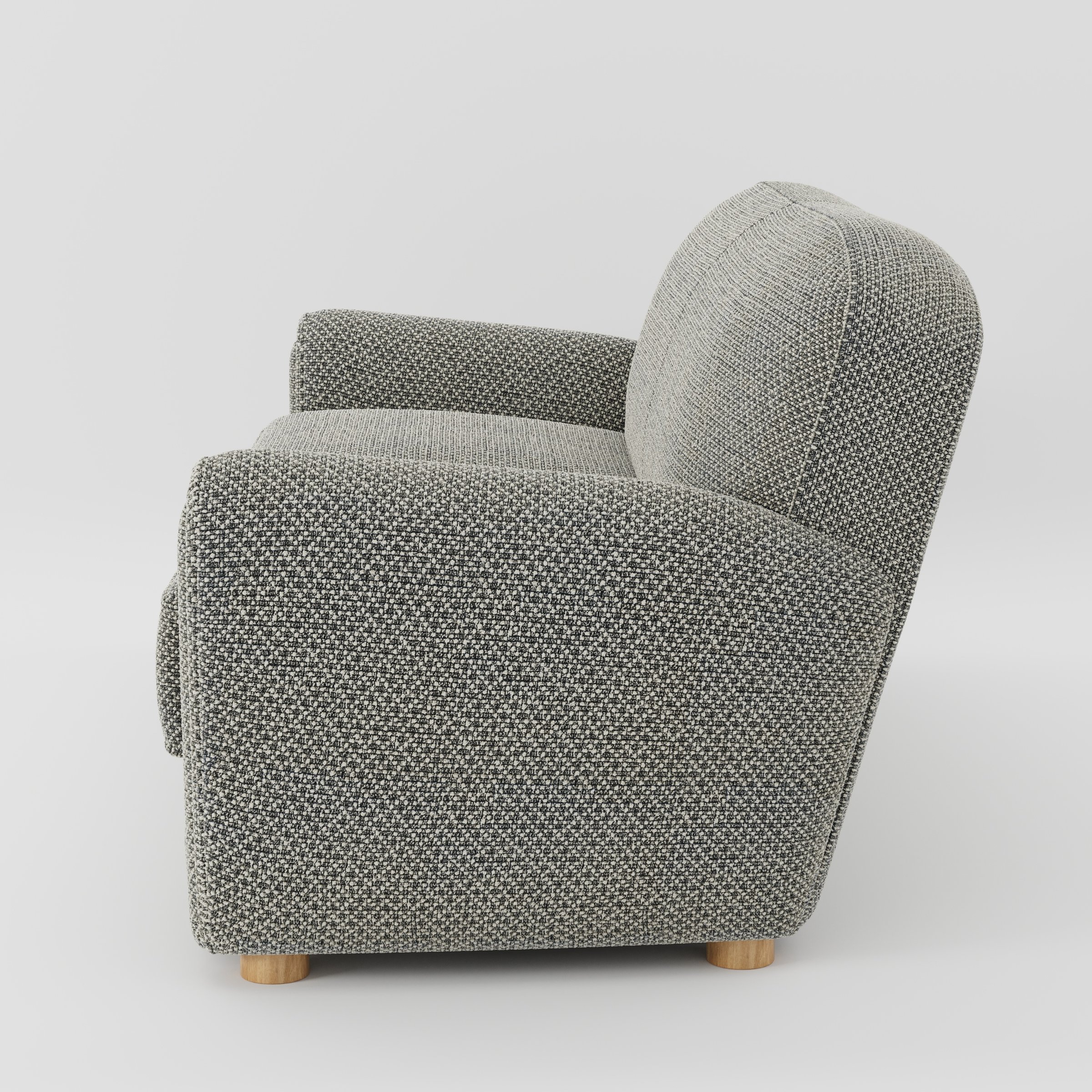 Fergus sofa in Rousay Wool Blend Tar and Chalk shown in side profile displaying proportions and overall silhouette.