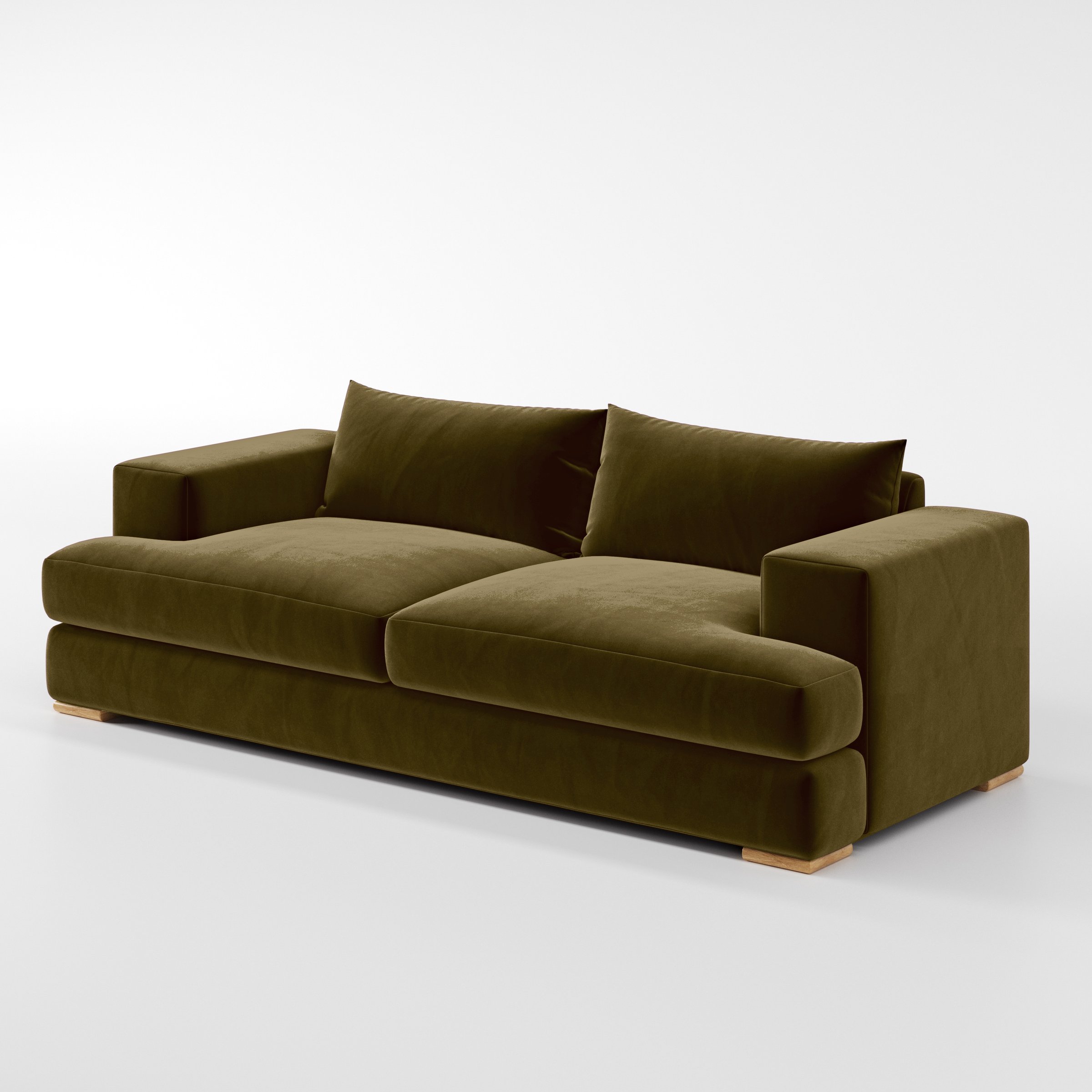 Diagonal view of the Fane sofa upholstered in Plush EasyClean Velvet in Cedar.