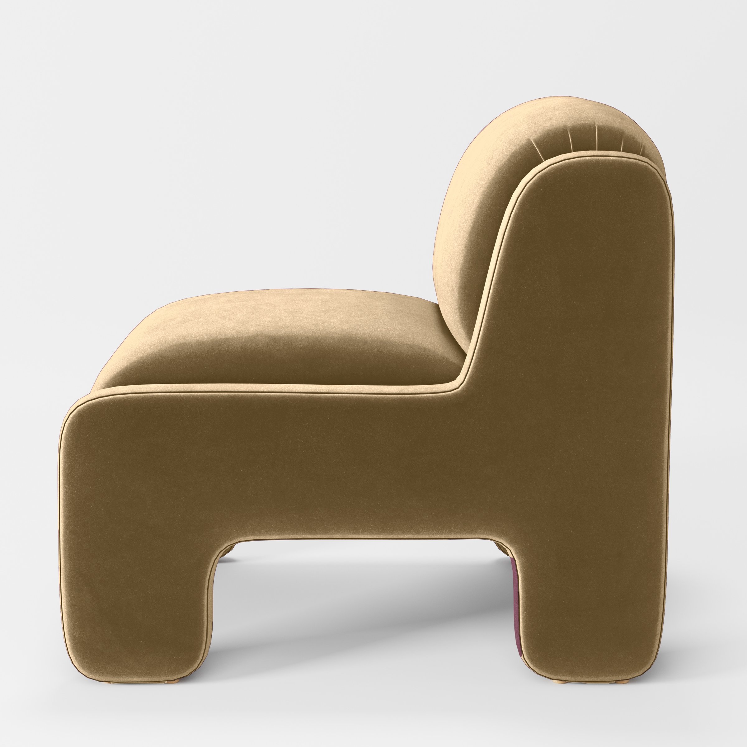 Side view of the Inny armchair upholstered in Plush EasyClean Velvet in Cafe.