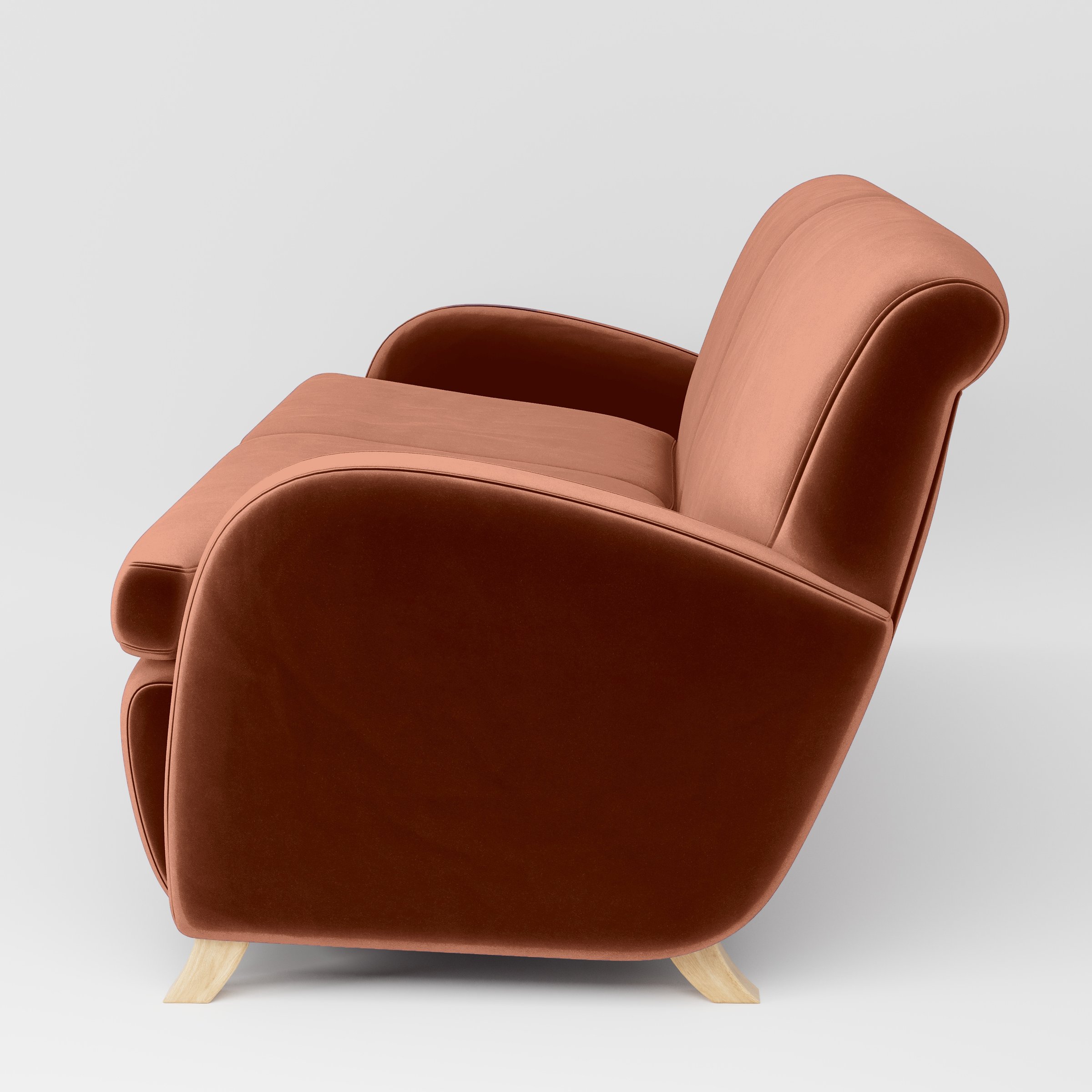 Side view of the Rye sofa upholstered in Plush EasyClean Velvet in Apricot.