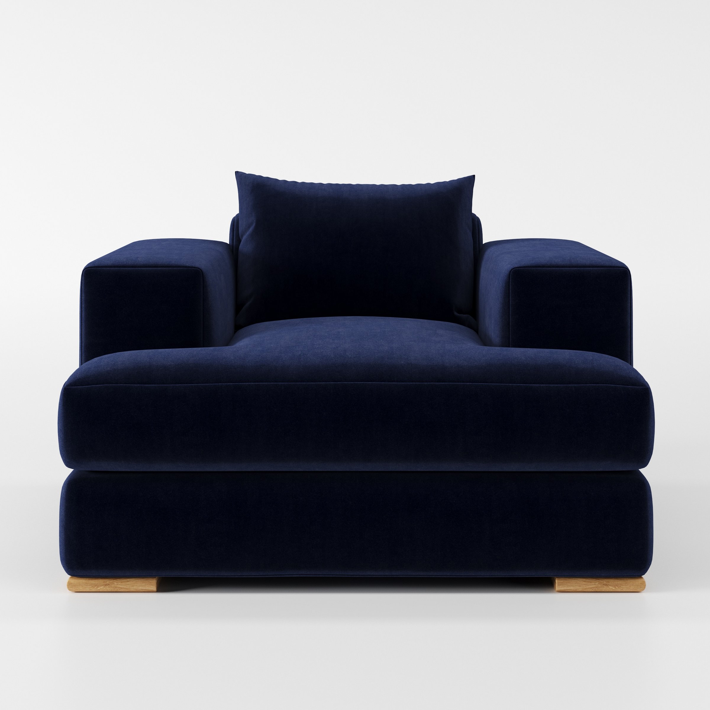 Fane armchair in Noss Velvet Navy shown front-on against a neutral studio backdrop.