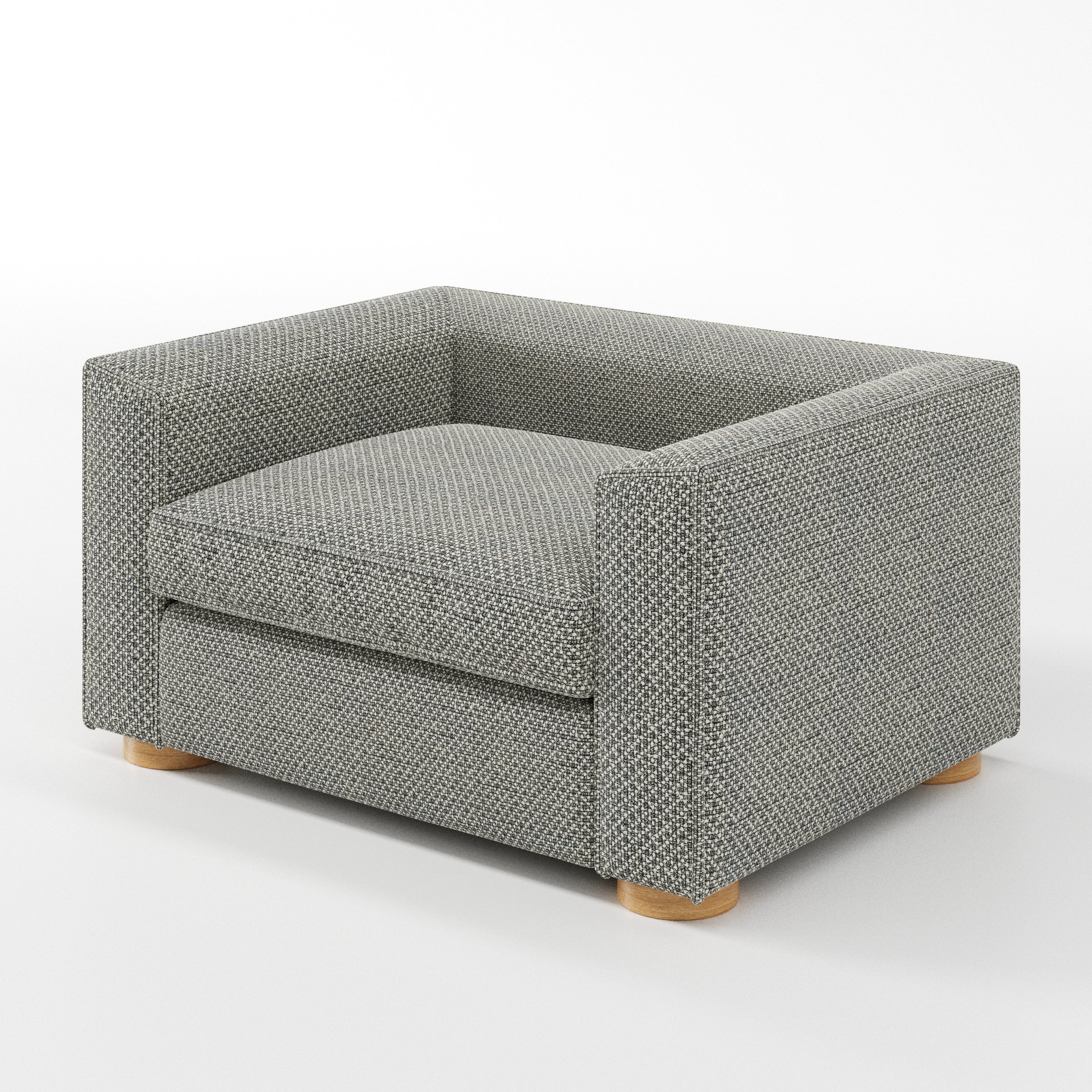 Feale armchair in Rousay Wool Blend Tar and Chalk shown at a diagonal angle highlighting arms and seat depth.