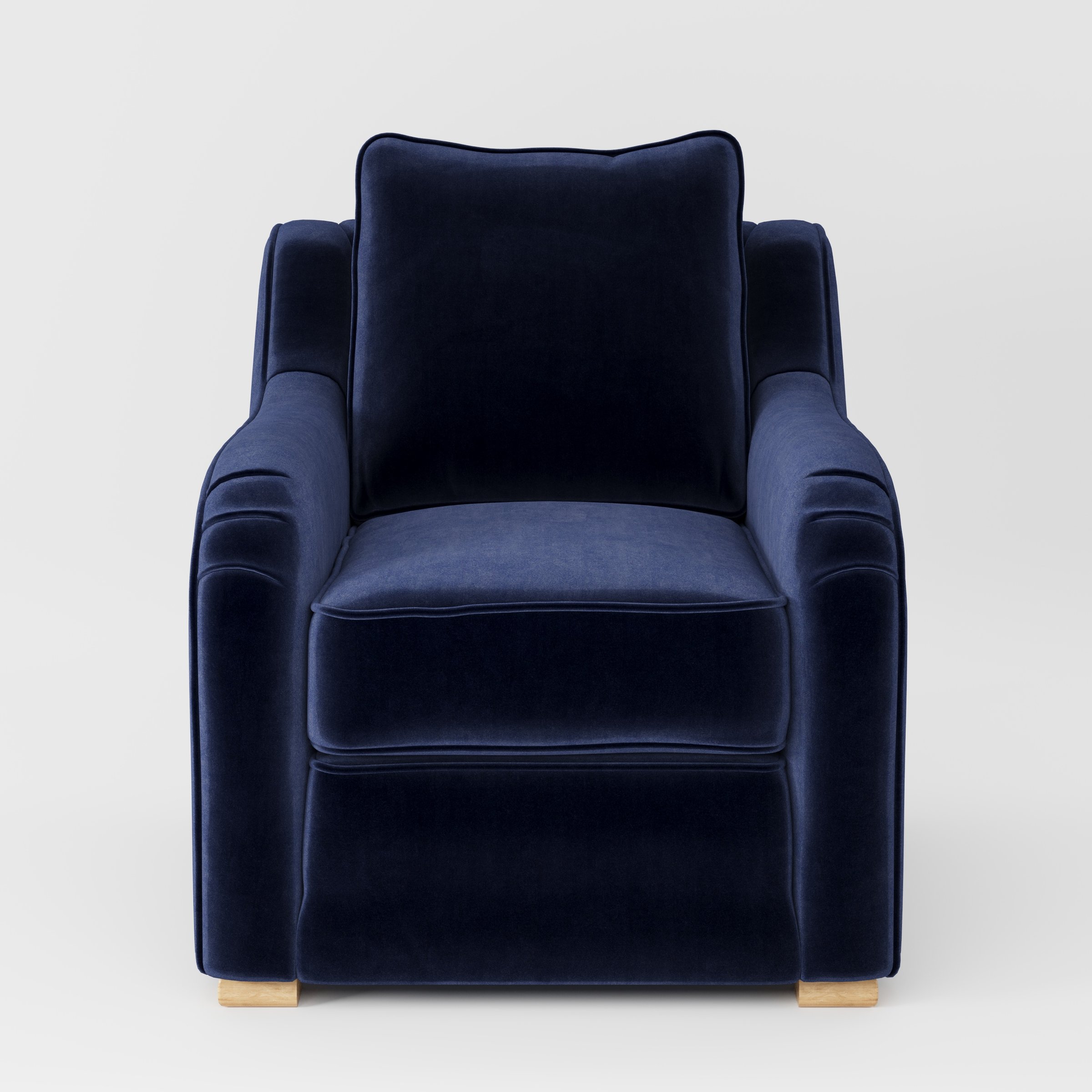 Cashel armchair in Noss Velvet Navy shown front-on against a neutral studio backdrop.