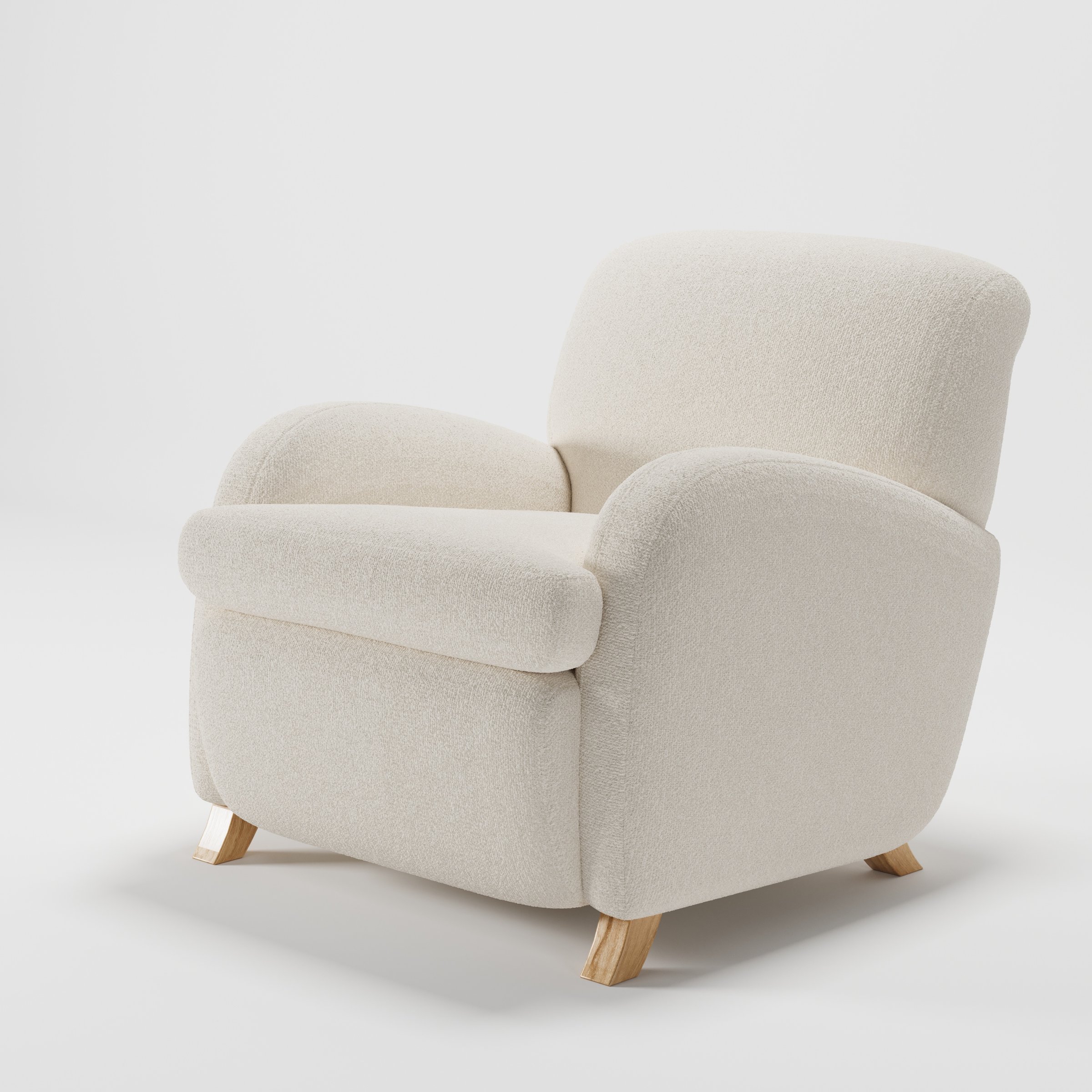 Rye armchair in Kilda Boucle Cream shown at a diagonal angle highlighting arms and seat depth.