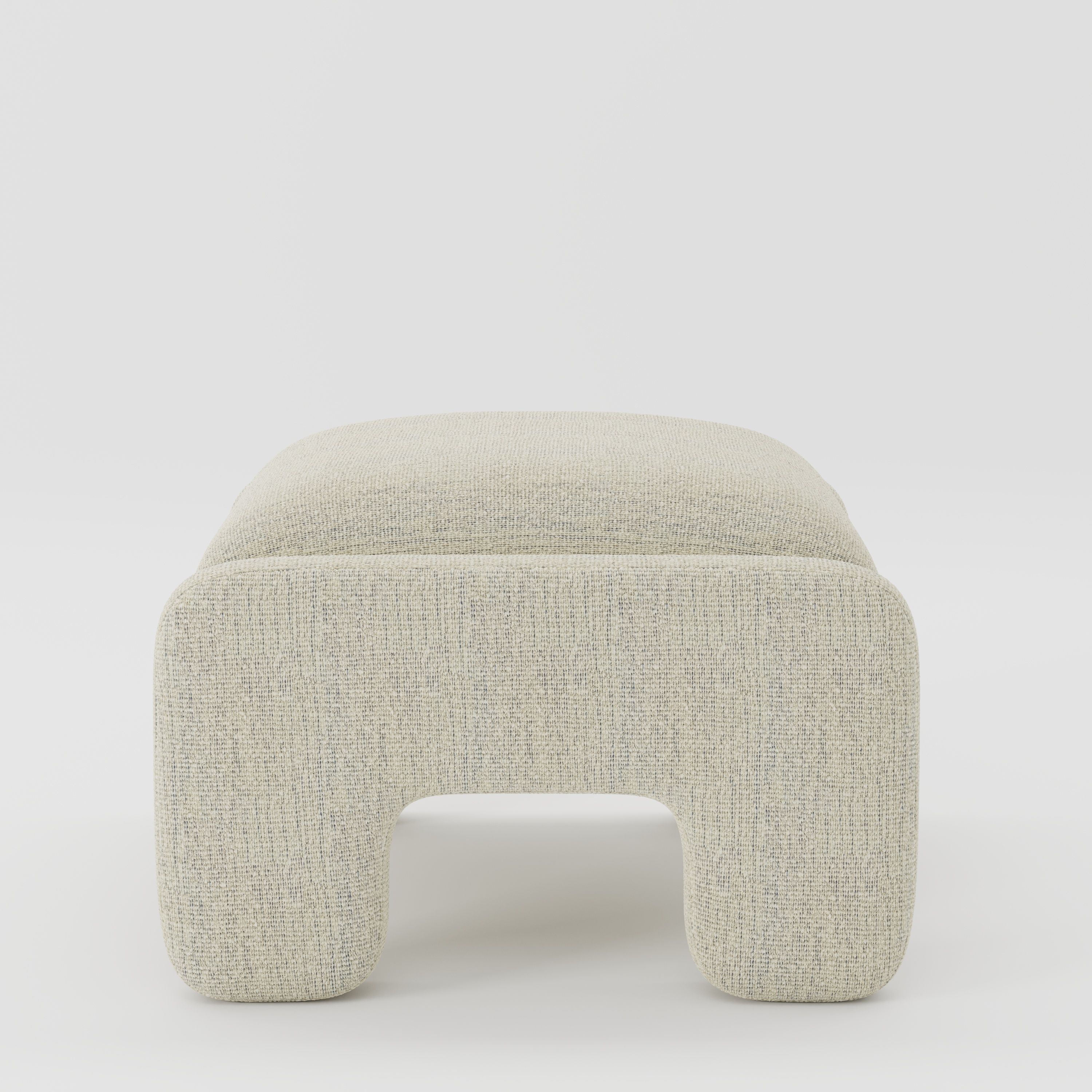 Inny footstool in Orsay bouclé cream and marine fabric, side view emphasising compact proportions and textured finish