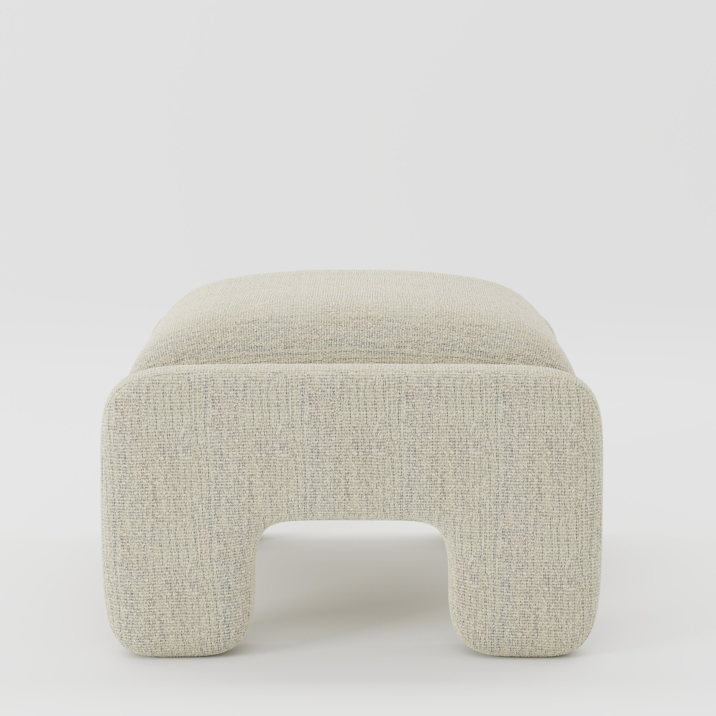 Inny footstool in Orsay bouclé cream and marine fabric, side view emphasising compact proportions and textured finish