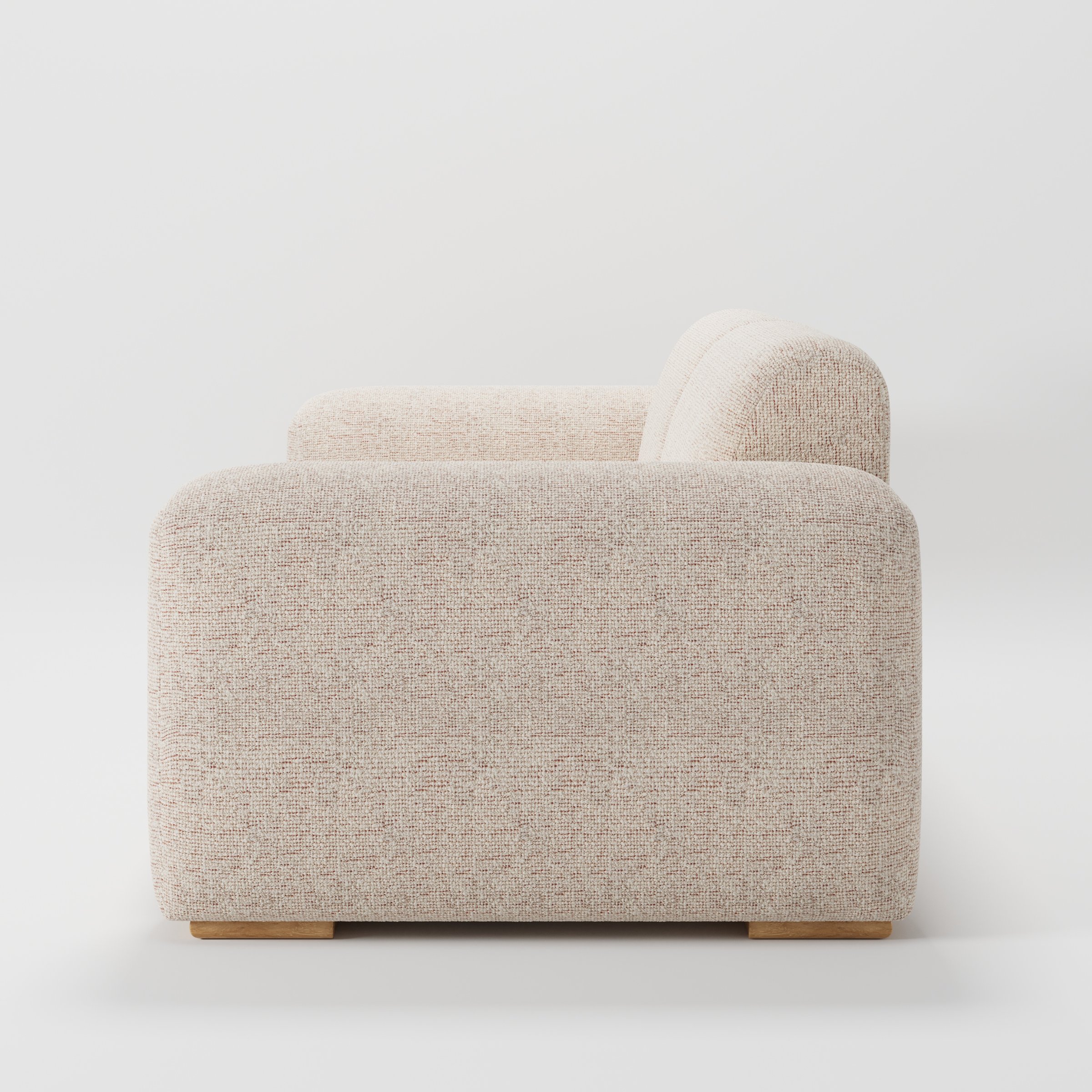 Darwell sofa in Orsay Boucle Cream and Copper shown in side profile displaying proportions and overall silhouette.