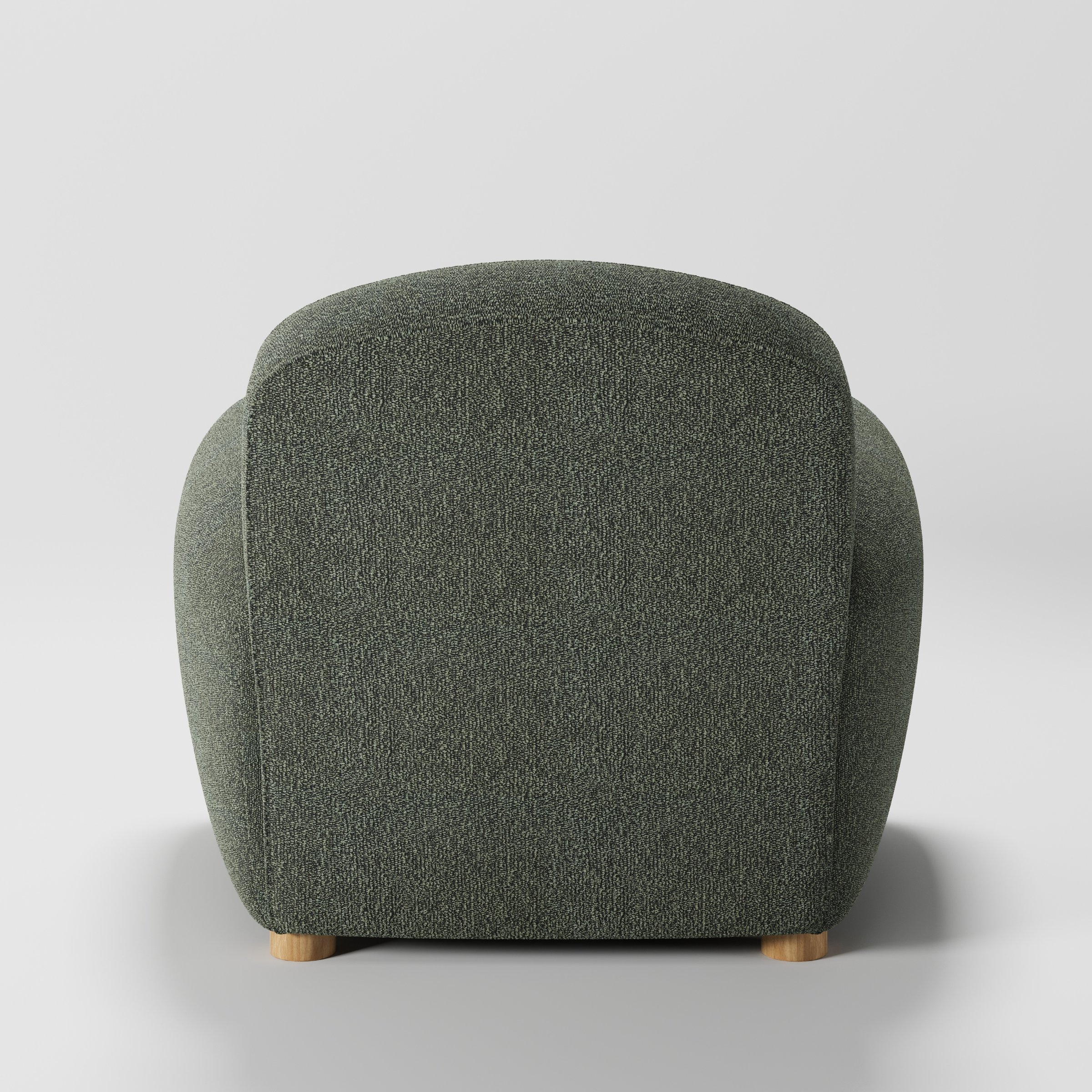 Fergus armchair in Kilda Boucle Moss shown from the rear highlighting backrest shape and upholstery finish.