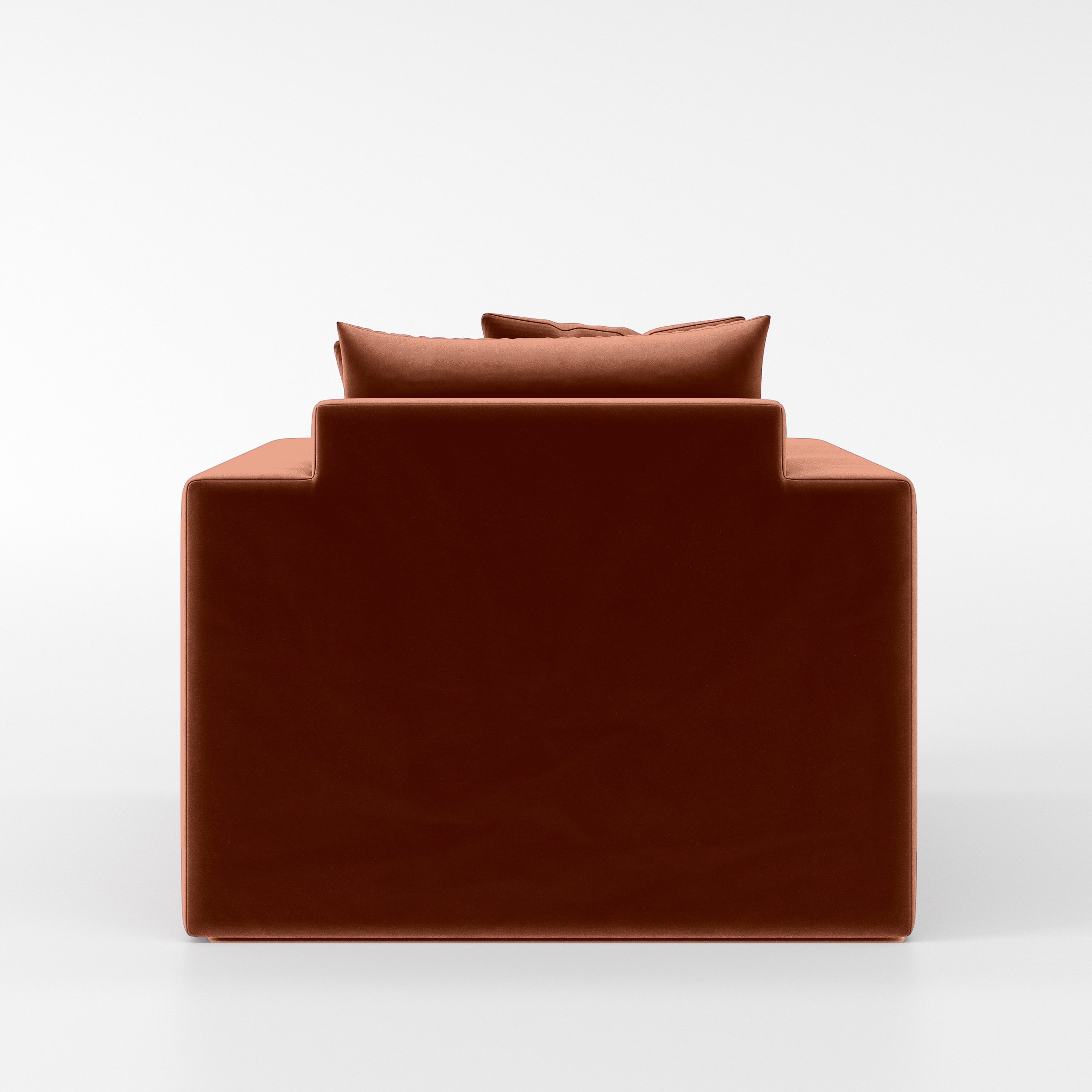 Rear view of the Coniston armchair upholstered in Plush EasyClean Velvet in Apricot.