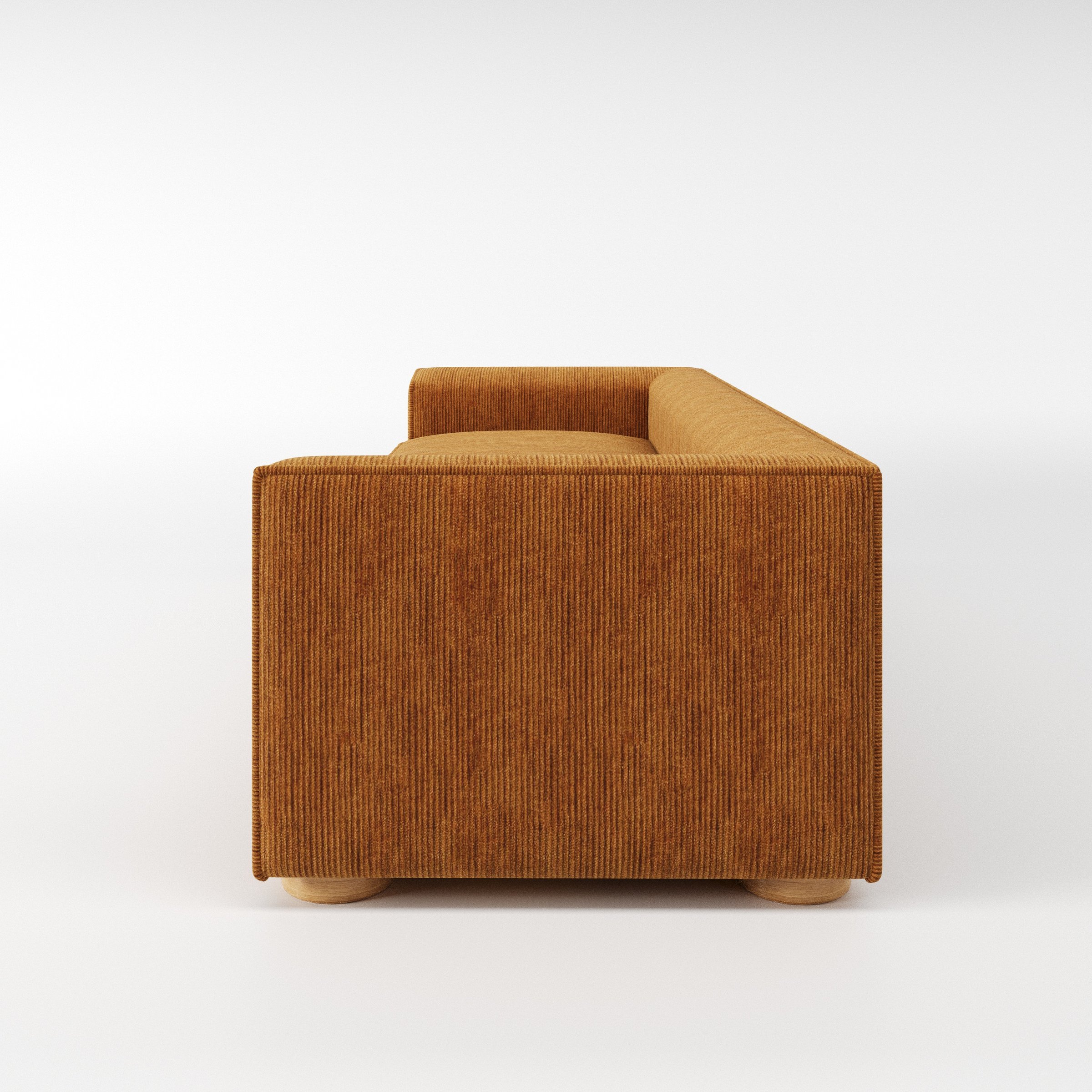 Feale sofa in Caldey Velvet Corduroy Tobacco shown in side profile displaying proportions and overall silhouette.