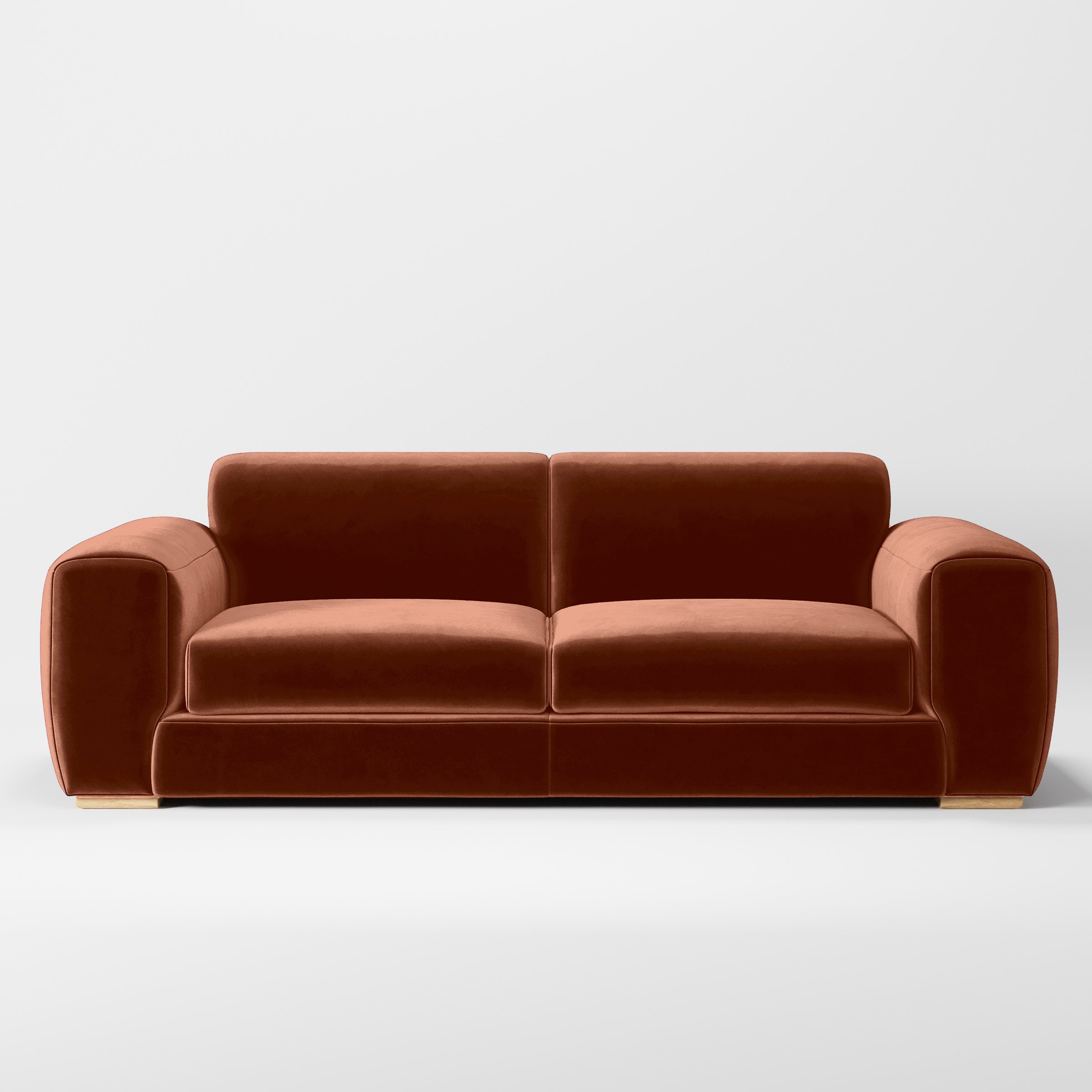 Front view of the Darwell sofa upholstered in Plush EasyClean Velvet in Apricot.