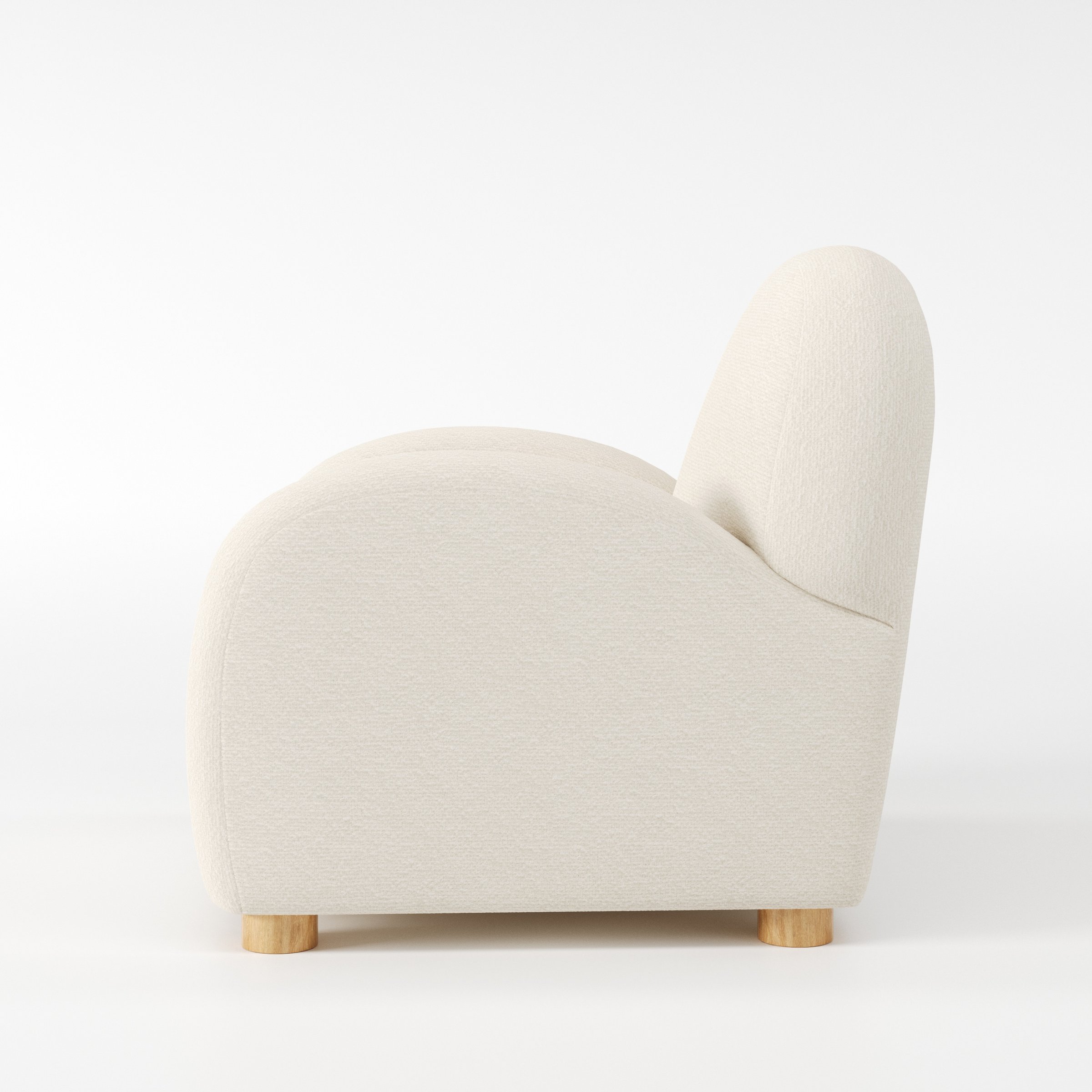 Awe armchair in Kilda Boucle Cream shown in side profile displaying proportions and overall silhouette.