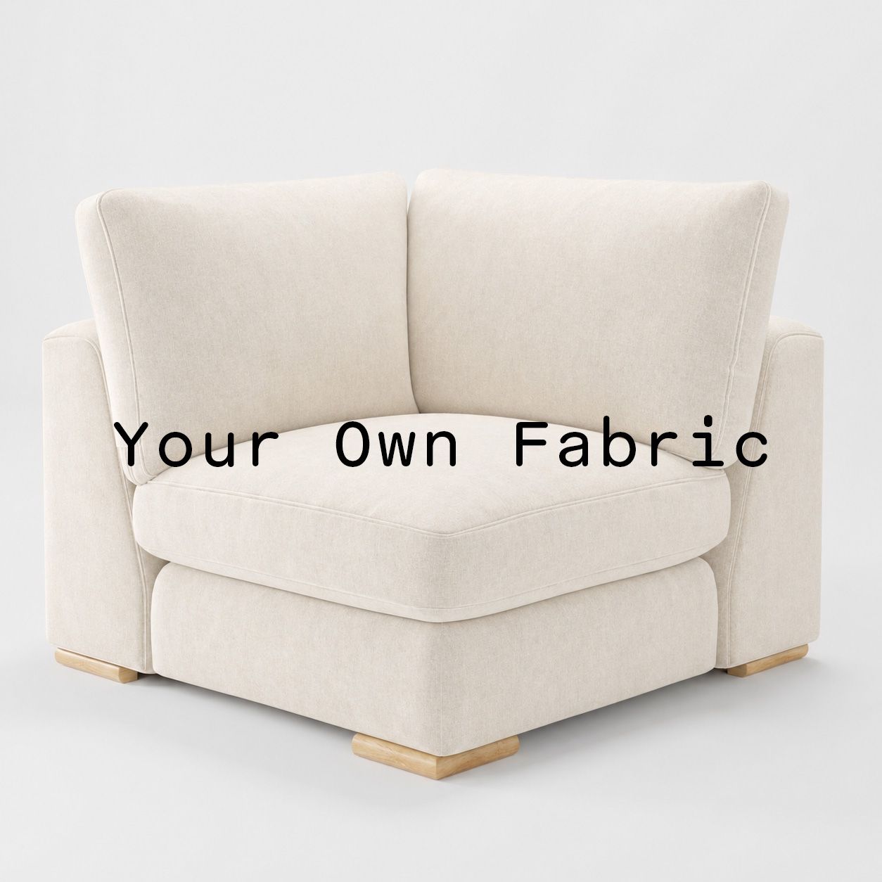Diagonal view of the Olton corner unit upholstered in customers own material calico cotton fabric.