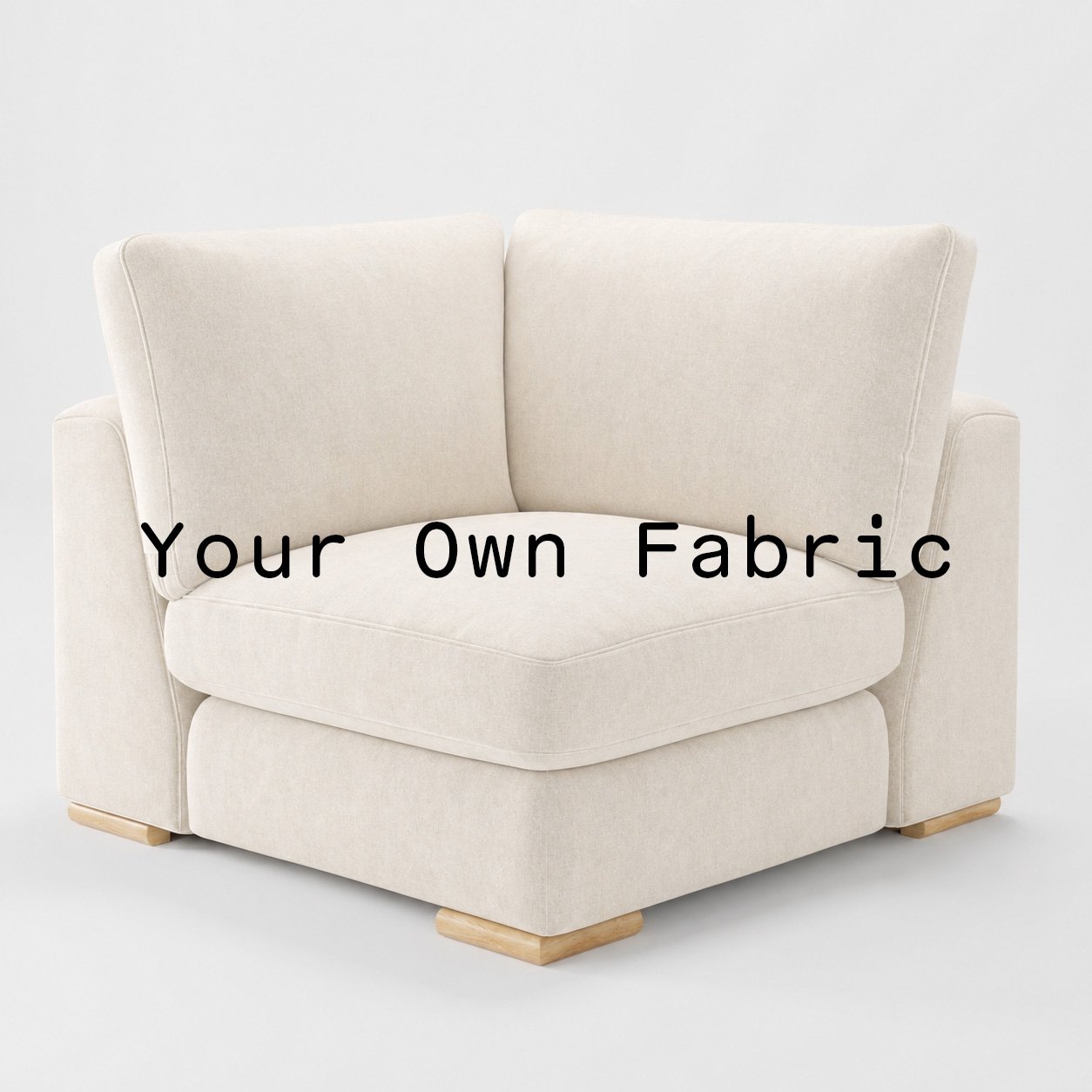 Diagonal view of the Olton corner unit upholstered in customers own material calico cotton fabric.