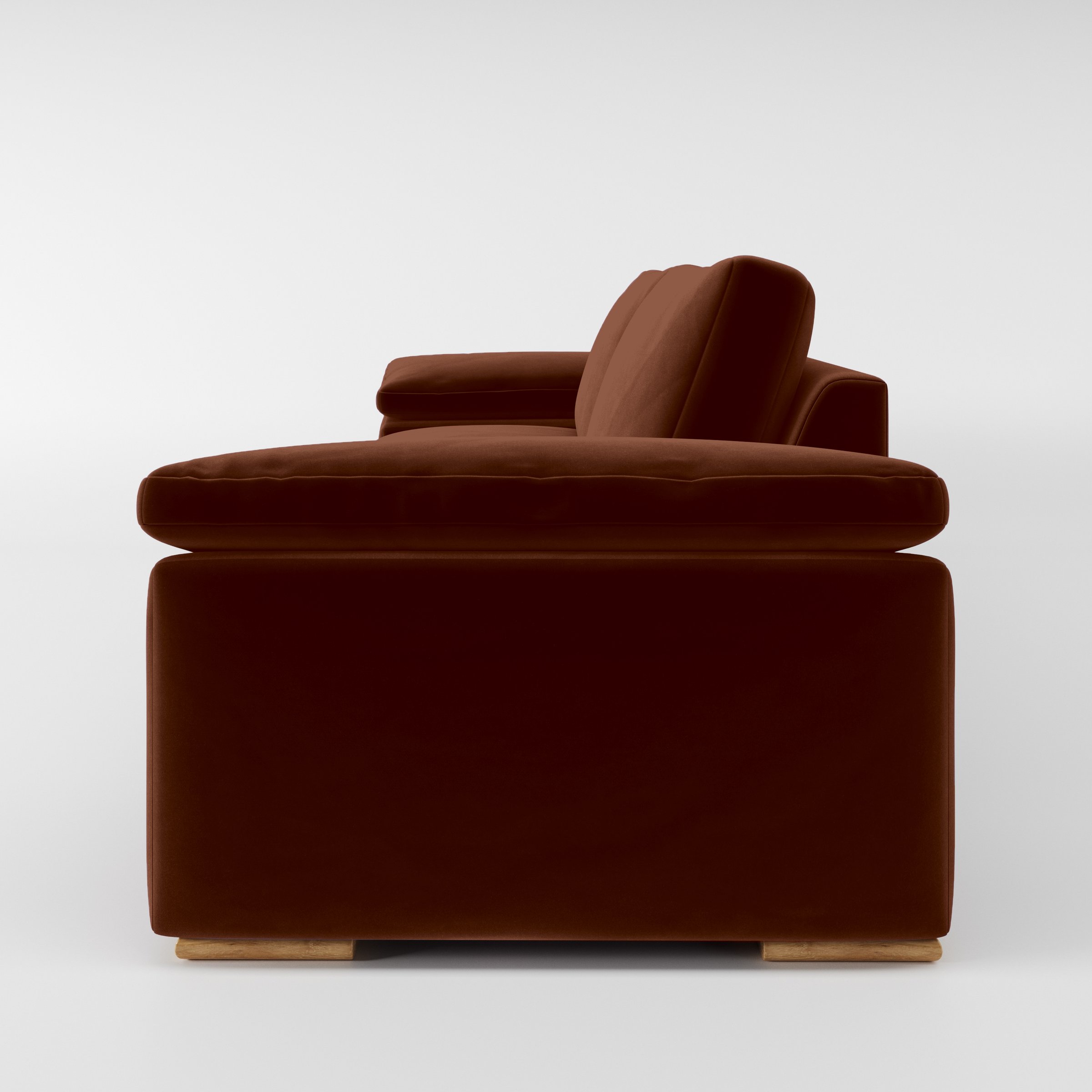 Side view of the Moy sofa upholstered in Plush EasyClean Velvet in Maple.
