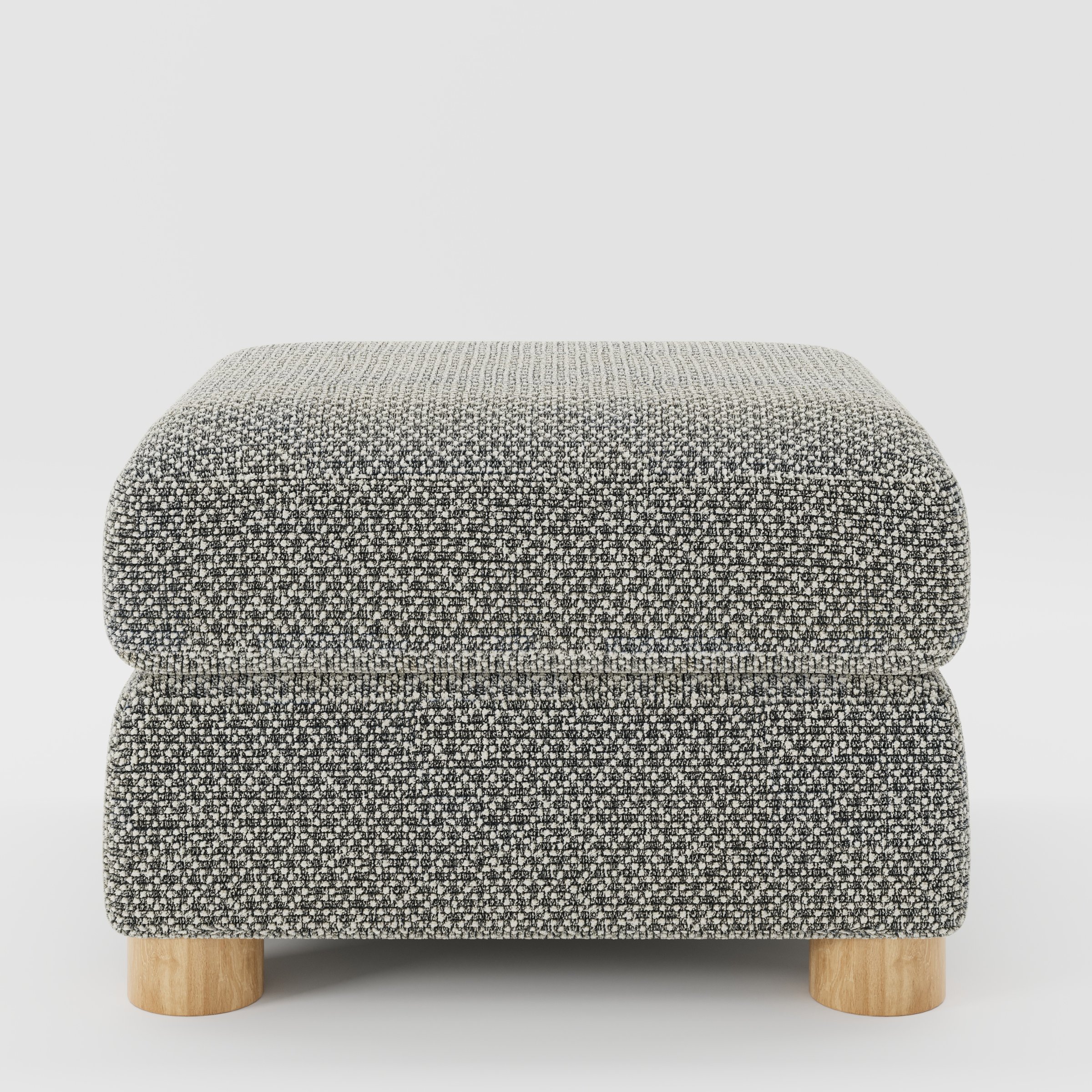 Windermere footstool in Rousay Wool Blend Tar and Chalk shown front-on against a neutral studio backdrop.
