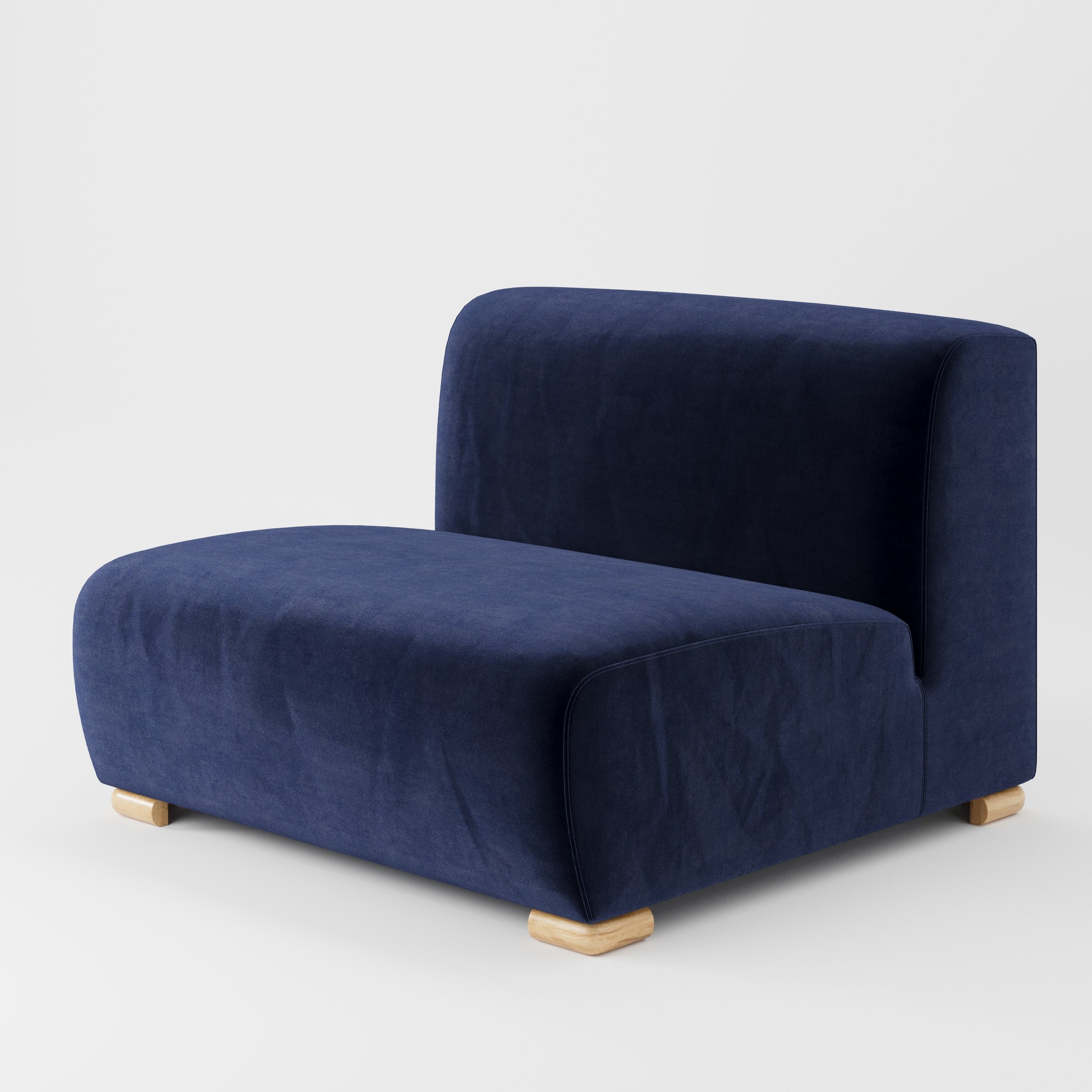 Tay single sofa unit in Noss Velvet Navy shown at a diagonal angle highlighting its soft rounded edges and compact, armless form.