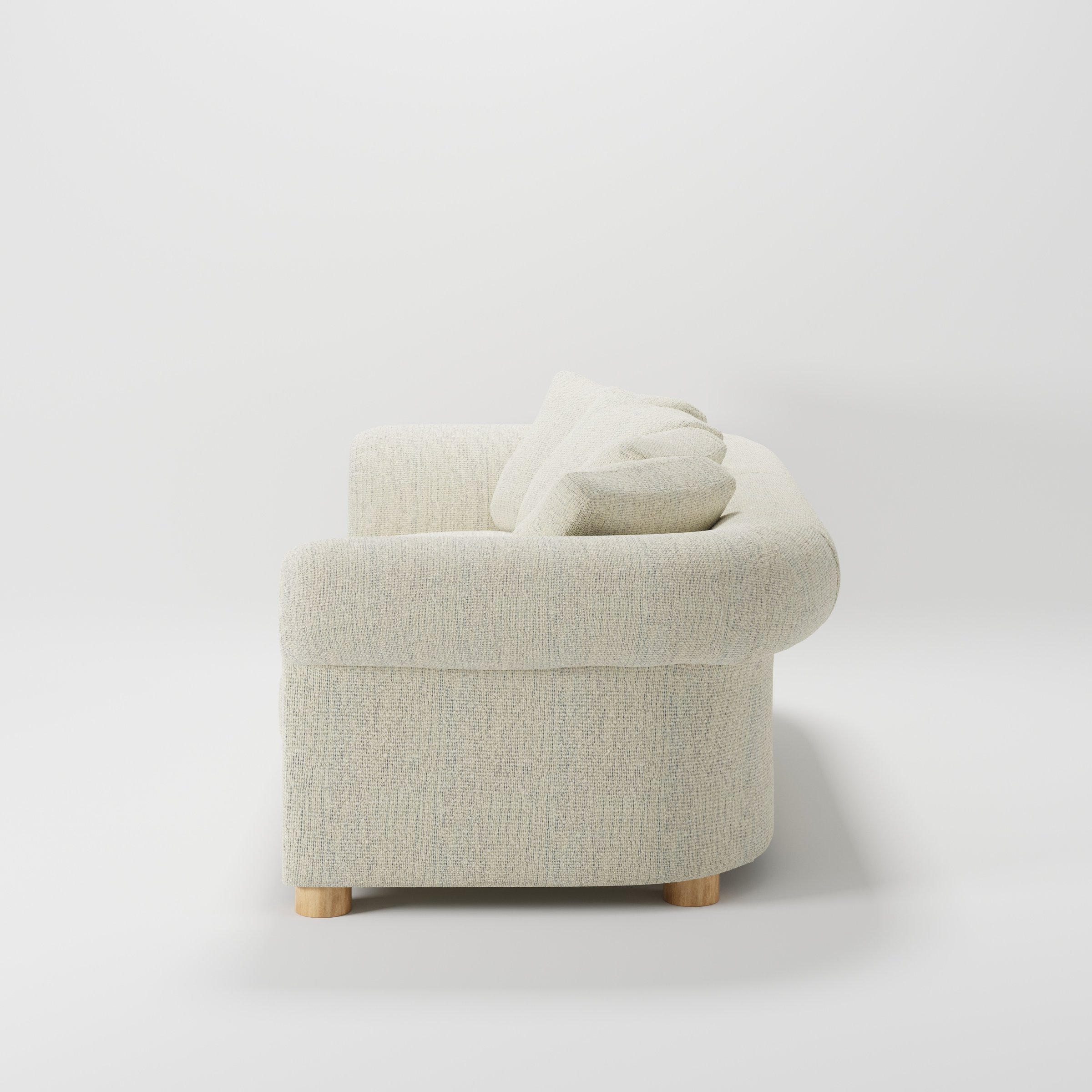 Windermere sofa in Orsay Boucle Cream and Marine shown in side profile displaying proportions and overall silhouette.