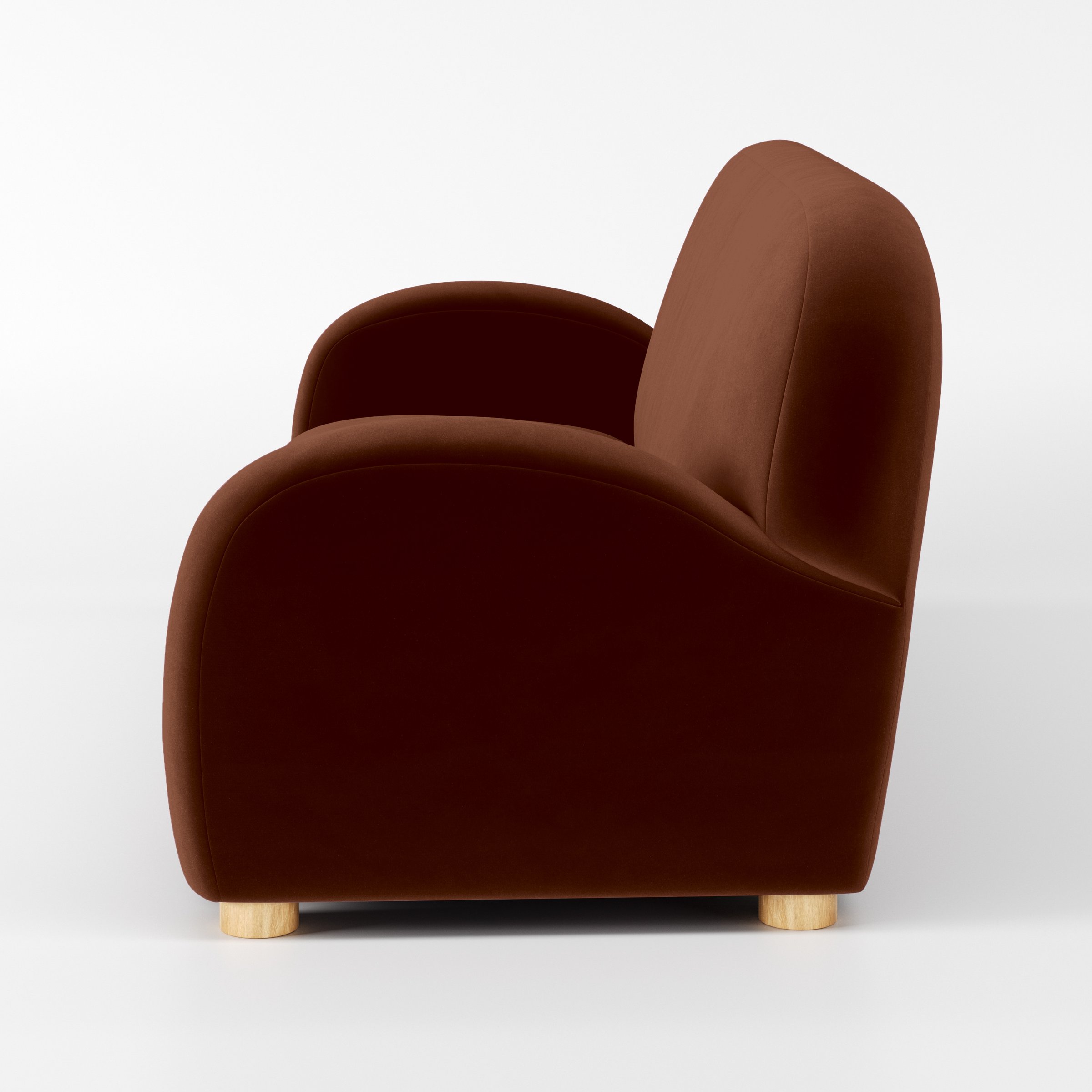 Side view of the Awe sofa upholstered in Plush EasyClean Velvet in Maple.