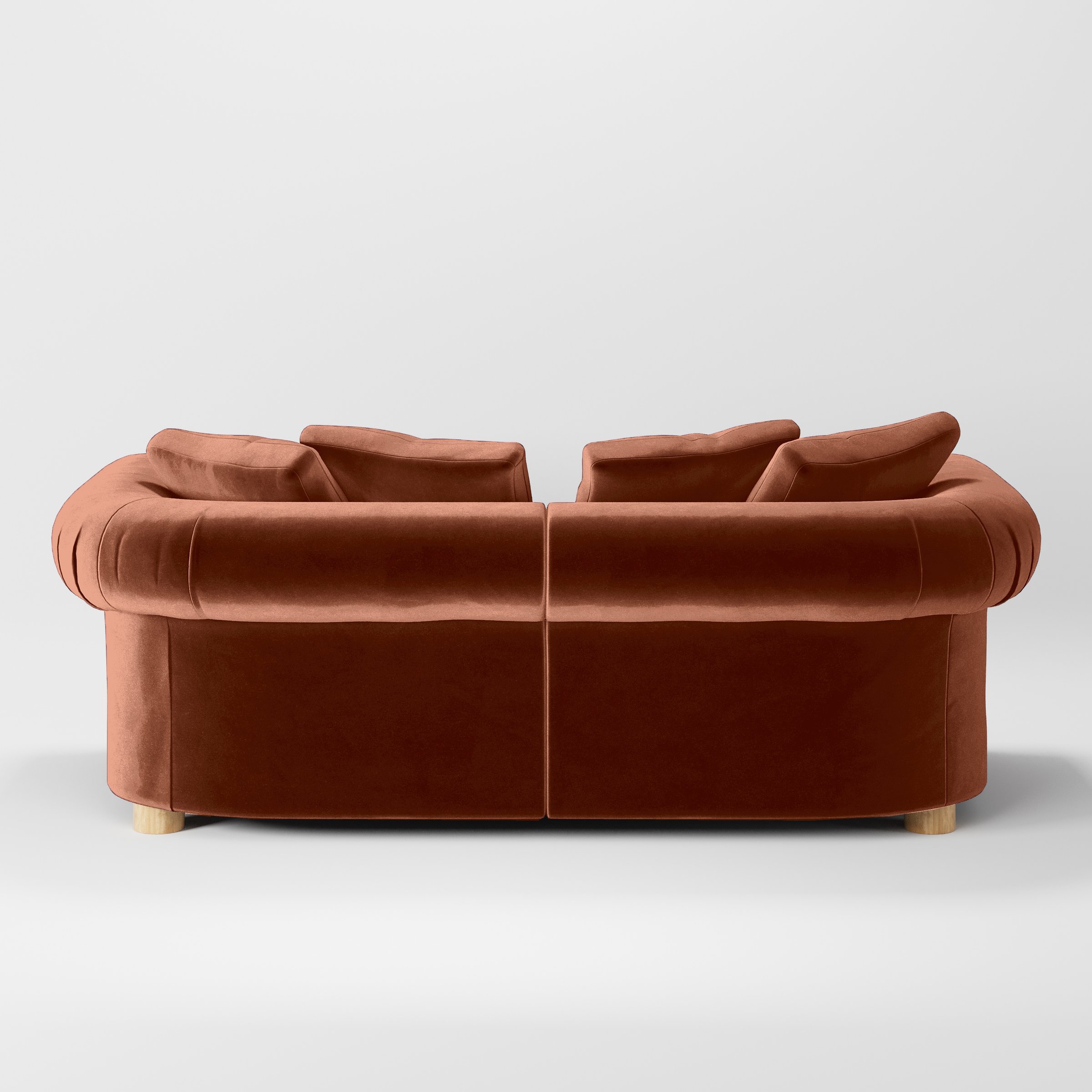 Rear view of the Windermere sofa upholstered in Plush EasyClean Velvet in Apricot.