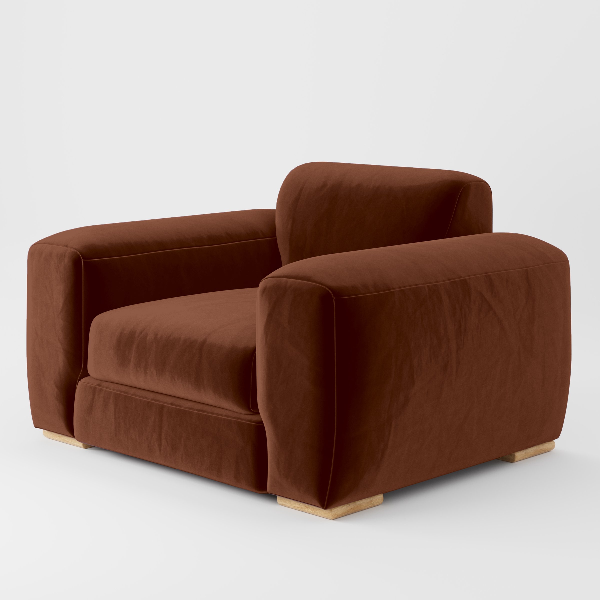 Diagonal view of the Darwell armchair upholstered in Plush EasyClean Velvet in Maple.