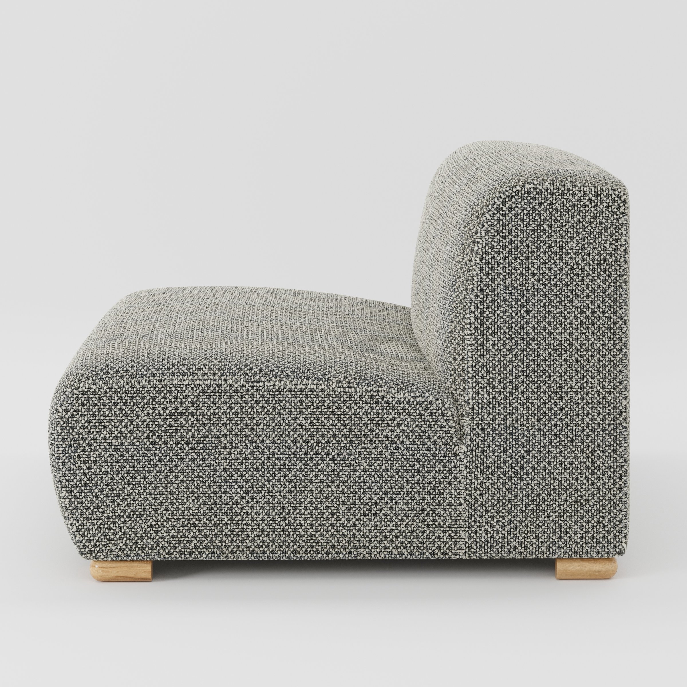 Tay single sofa unit in Rousay Wool Blend Tar and Chalk shown from the side showing the low backrest, deep seat and timber feet.