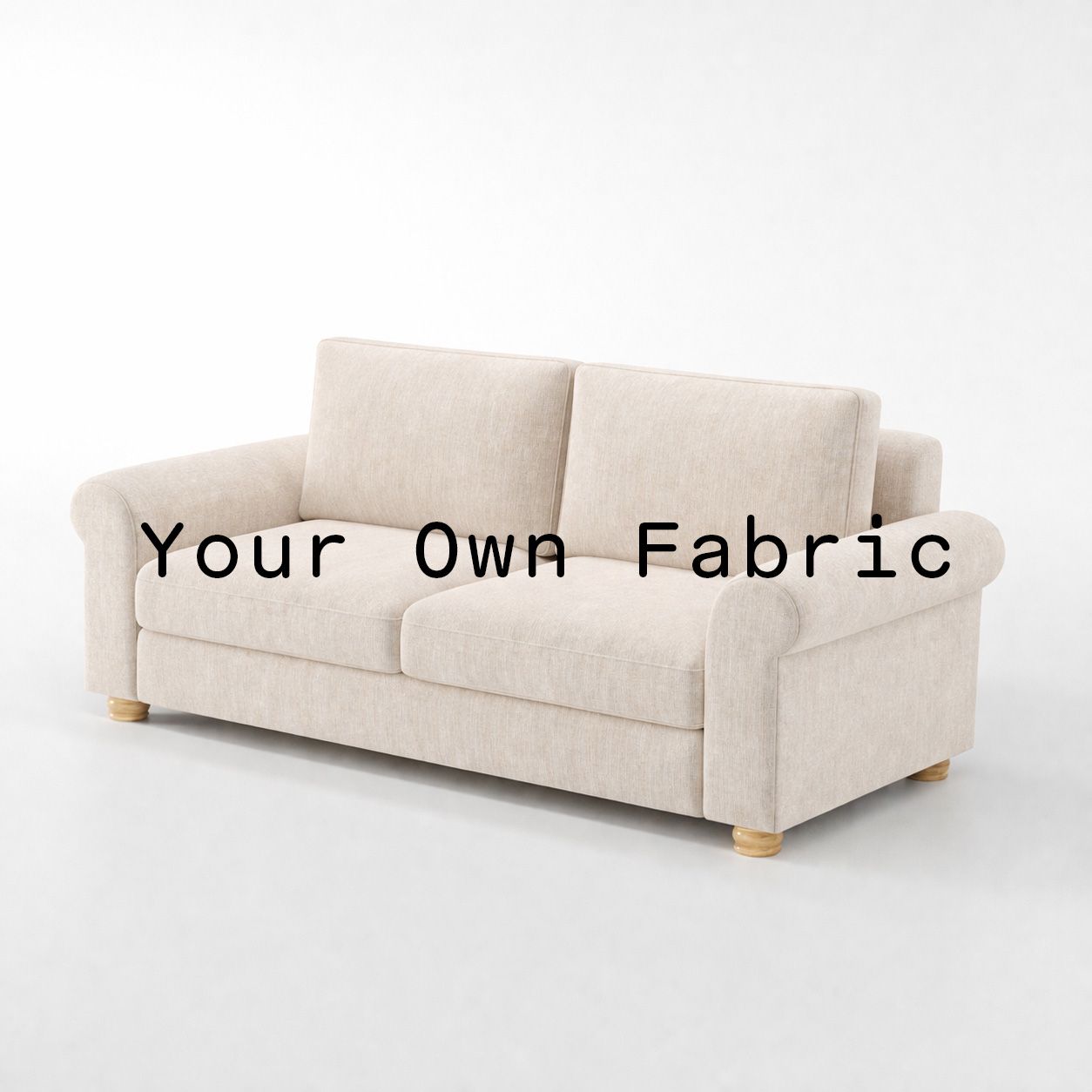 Diagonal view of the Anna Lee sofa upholstered in customers own material calico cotton fabric.