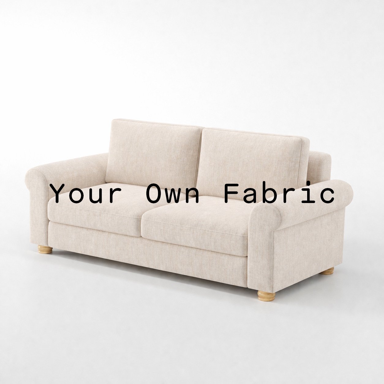Diagonal view of the Anna Lee sofa upholstered in customers own material calico cotton fabric.