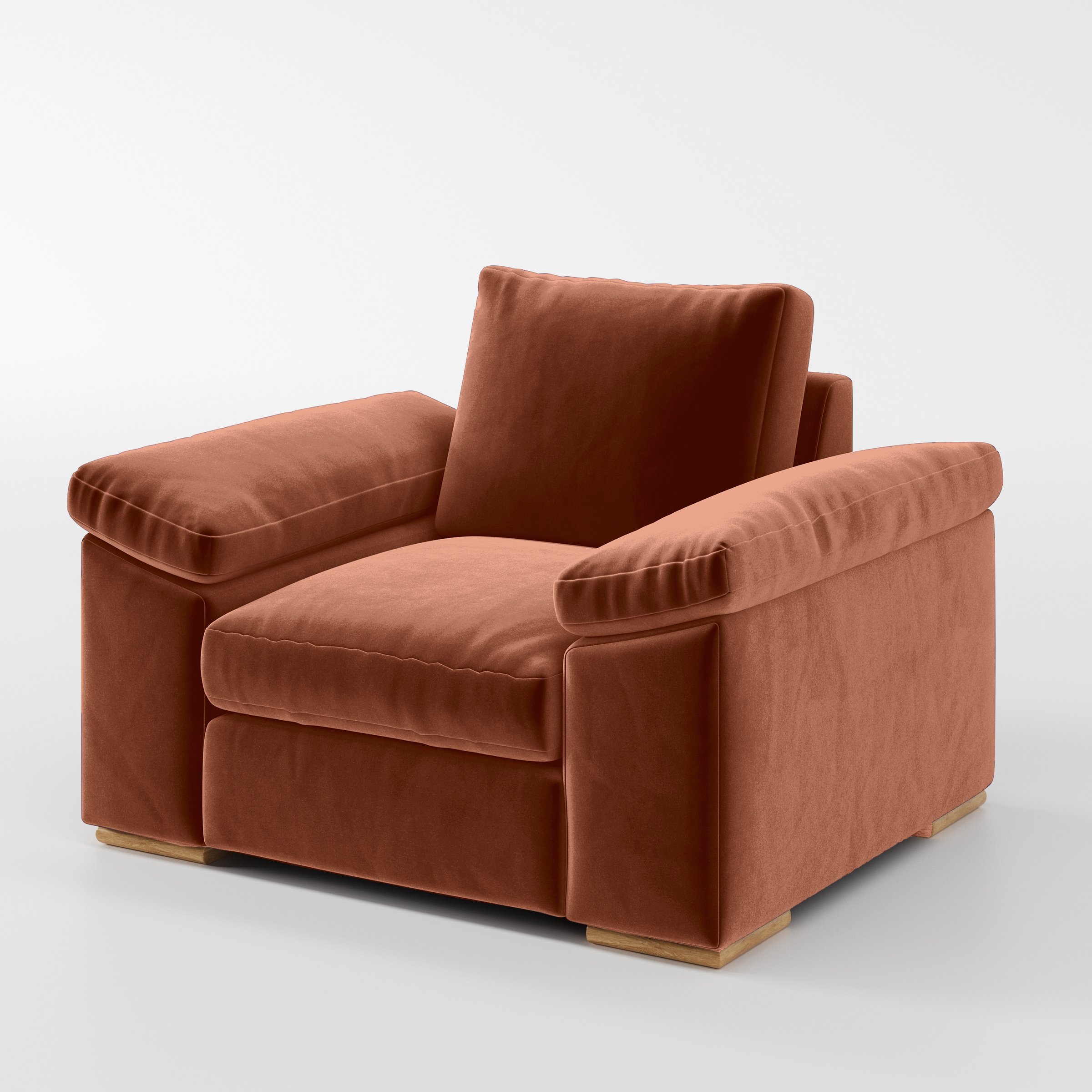 Diagonal view of the Moy armchair upholstered in Plush EasyClean Velvet in Apricot.