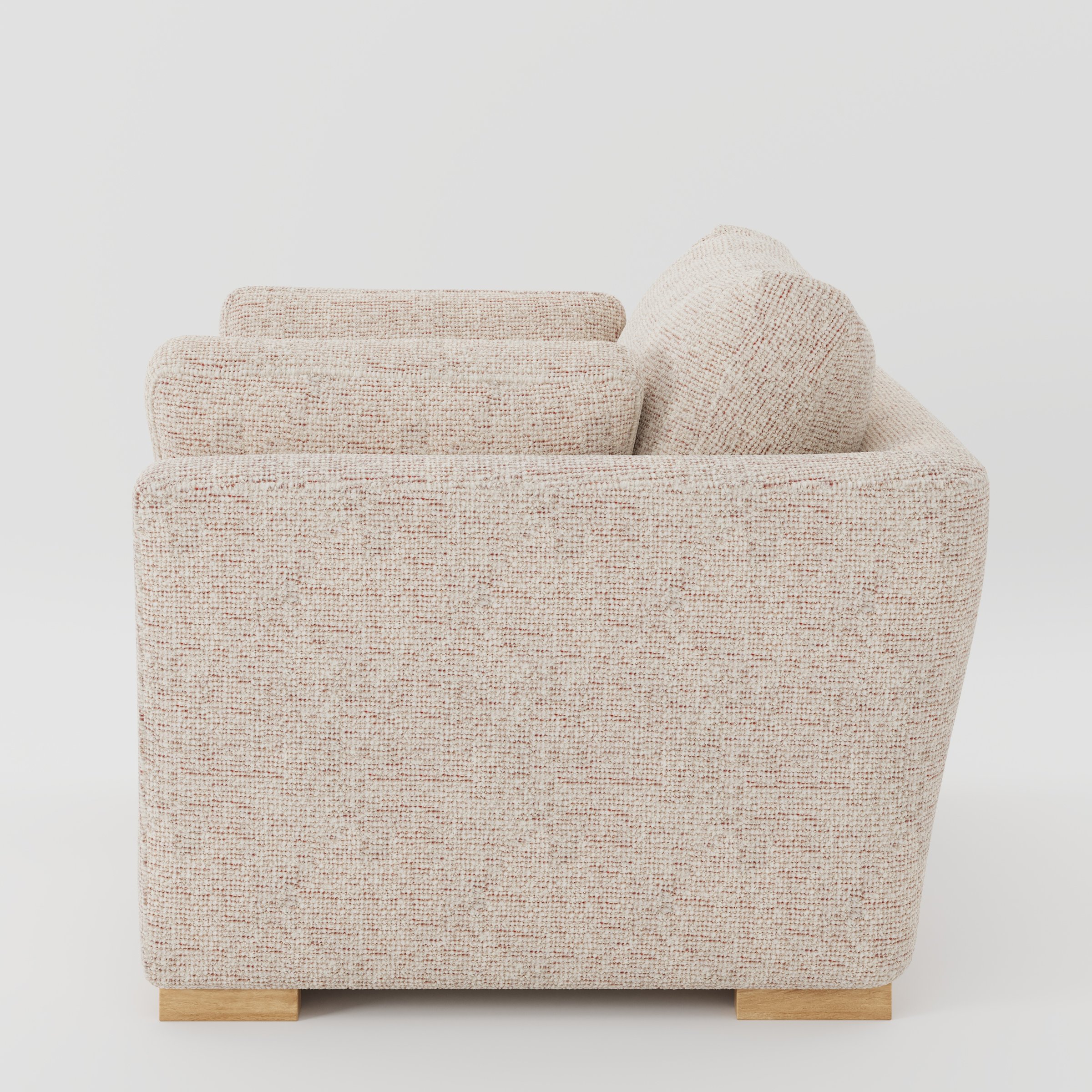 Stowe armchair in Orsay Boucle Cream and Copper shown in side profile displaying proportions and overall silhouette.