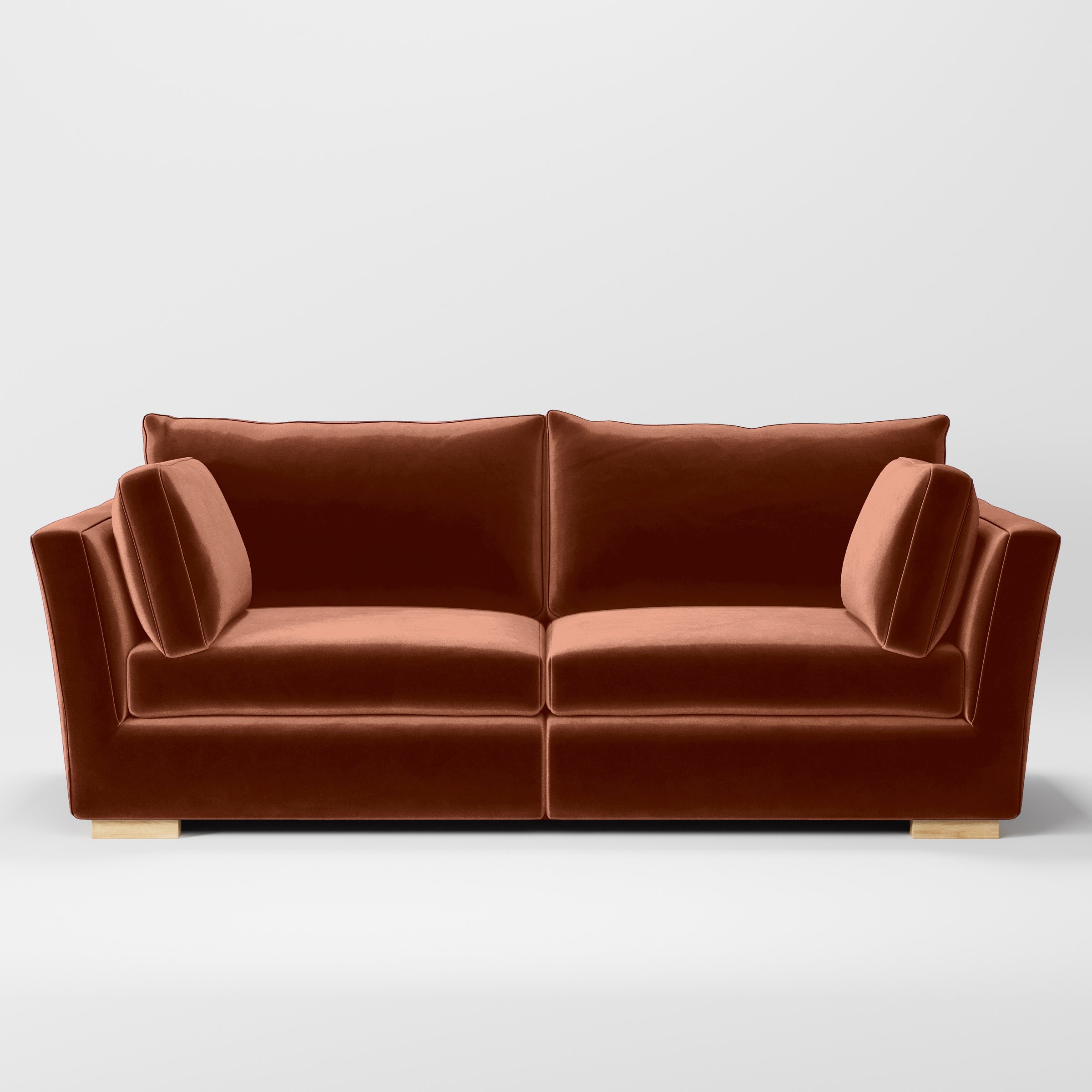 Front view of the Stowe sofa upholstered in Plush EasyClean Velvet in Apricot.