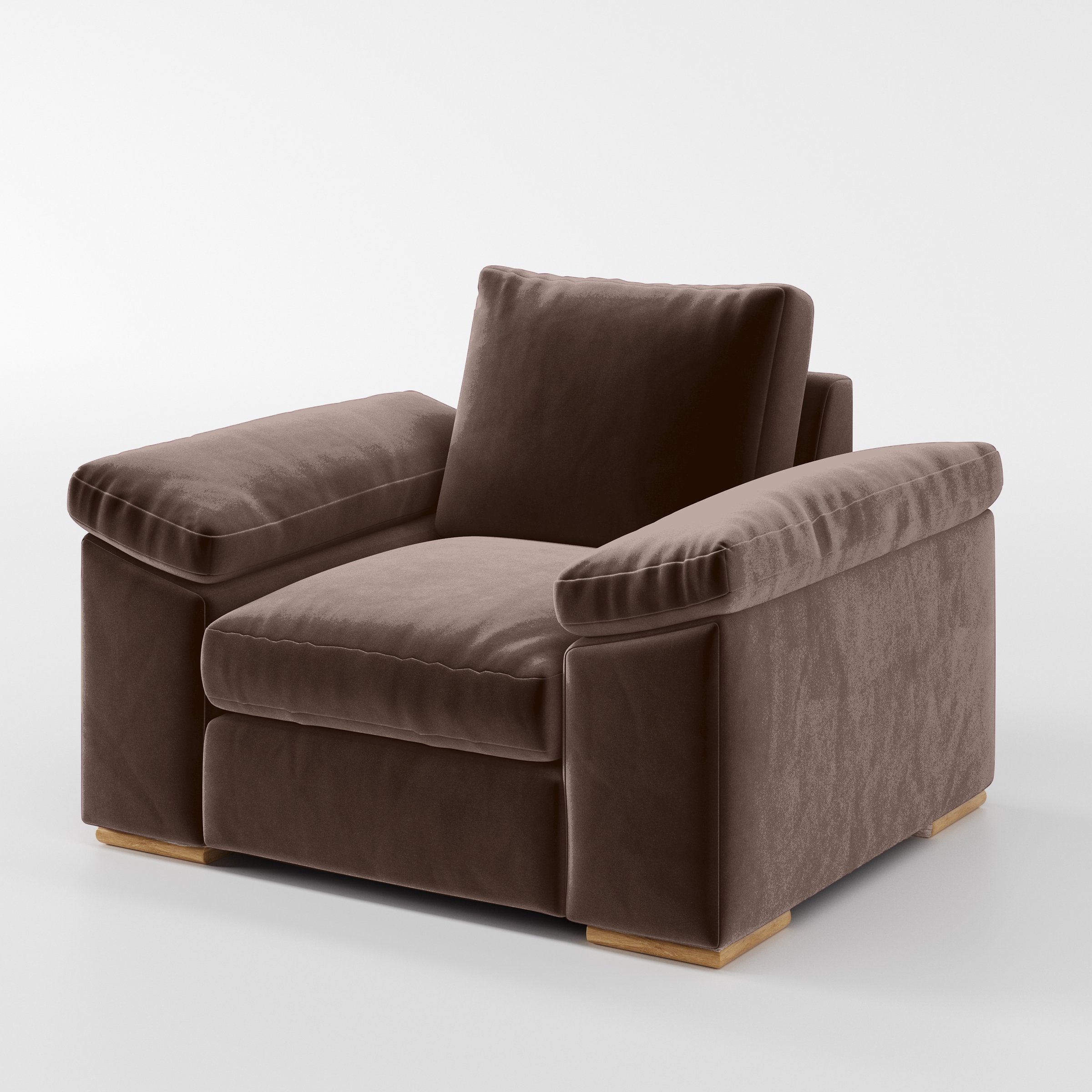 Diagonal view of the Moy armchair upholstered in Plush EasyClean Velvet in Mole.