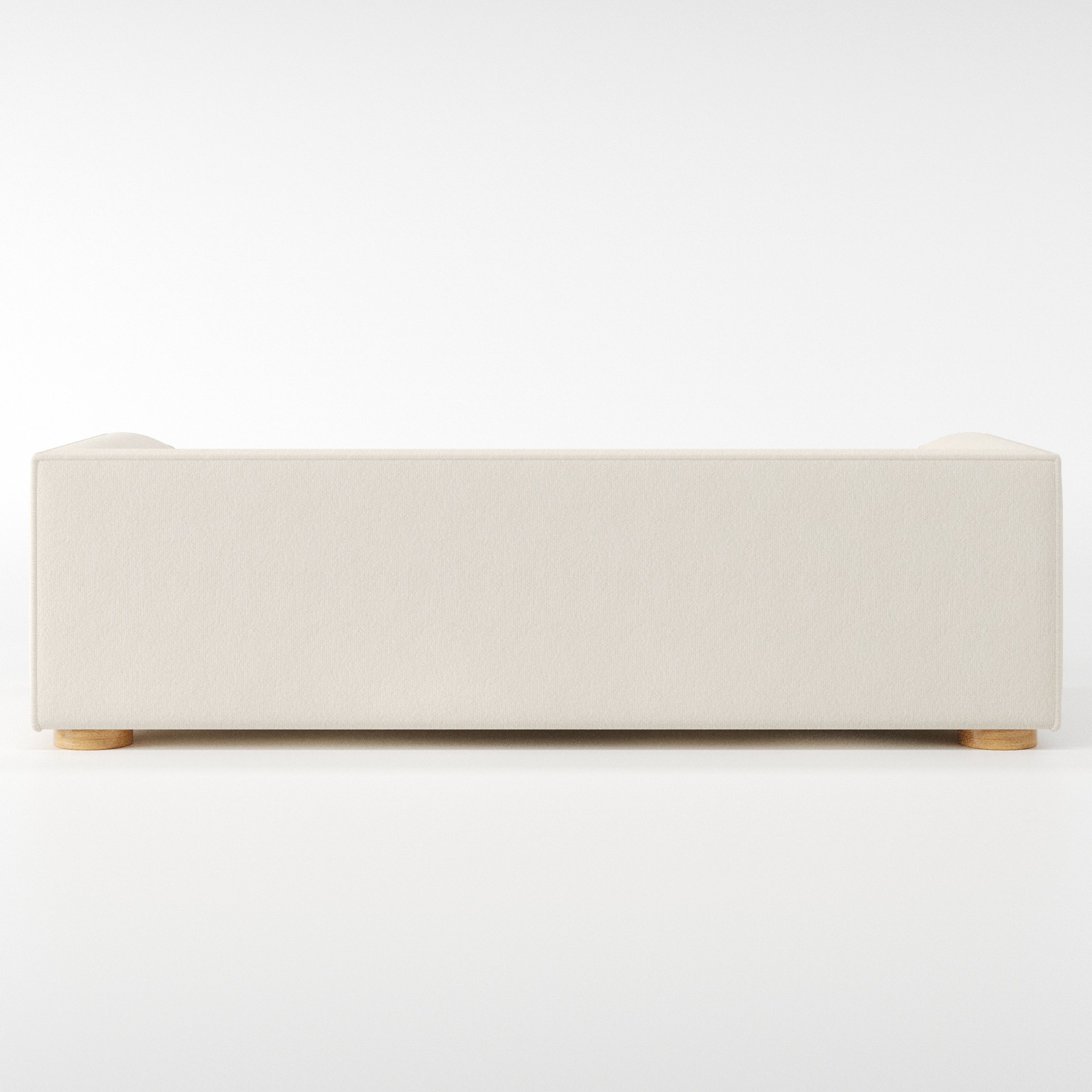 Feale sofa in Kilda Boucle Cream shown from the rear highlighting back cushions and upholstery finish.