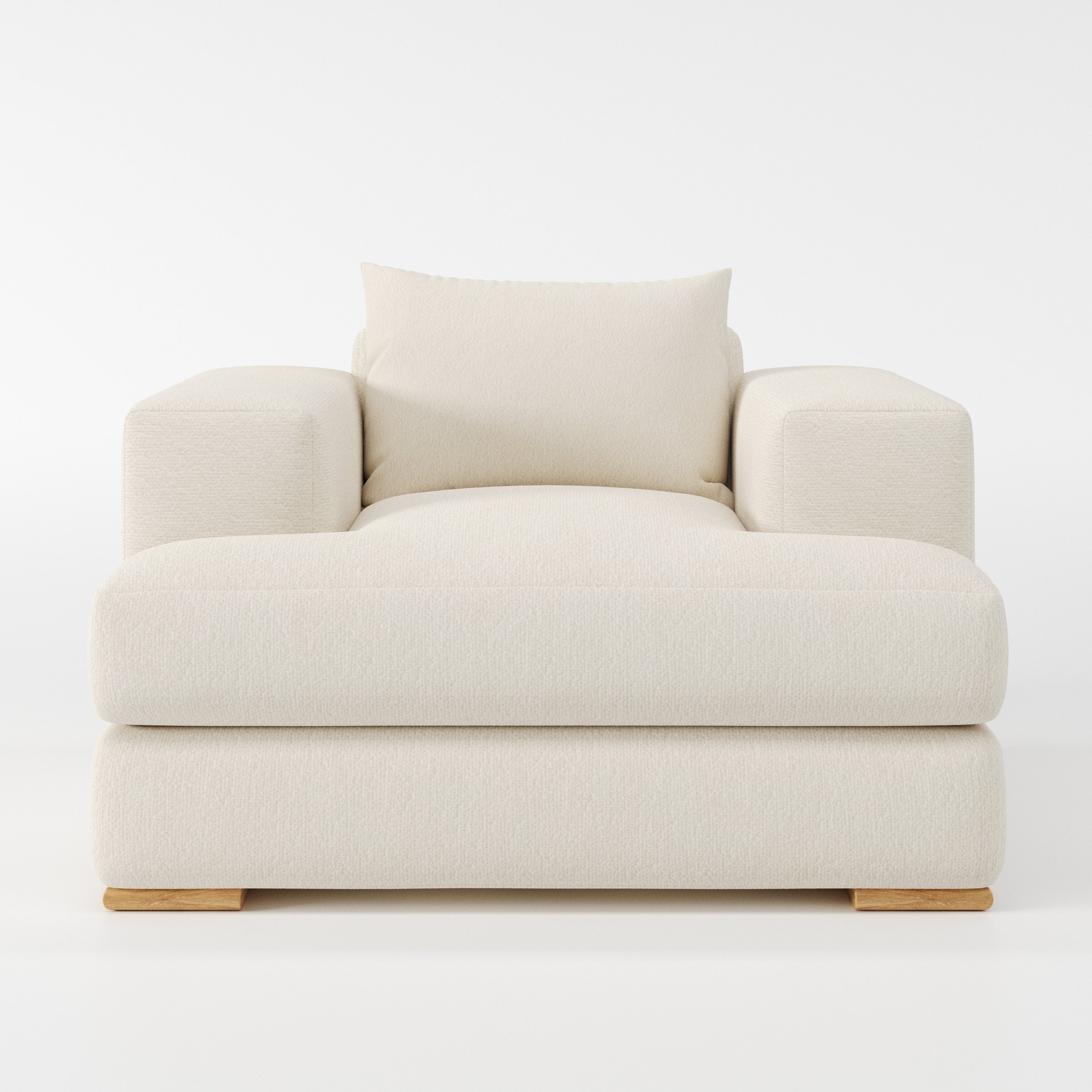 Fane armchair in Kilda Boucle Cream shown front-on against a neutral studio backdrop.