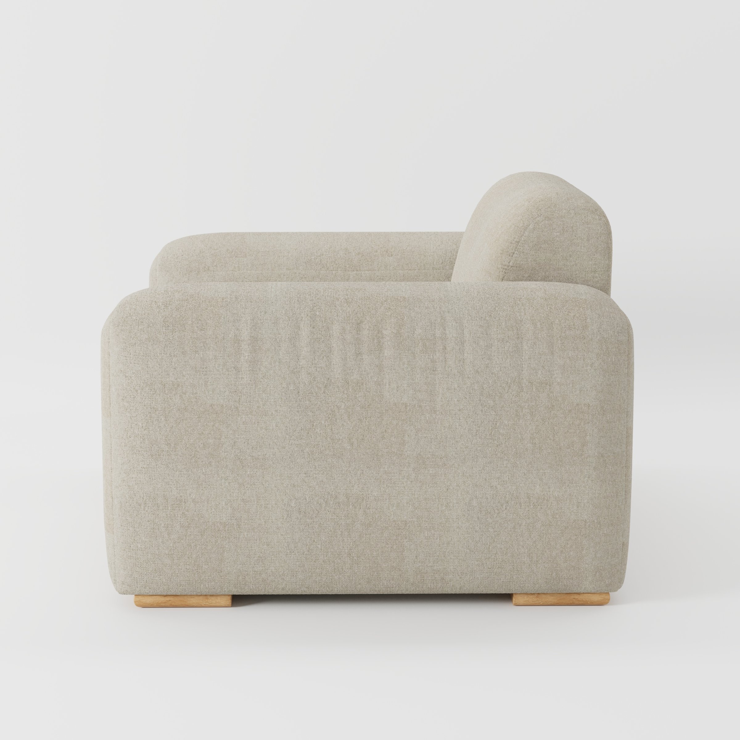 Darwell armchair in Alderney Linen Oatmeal shown in side profile displaying proportions and overall silhouette.