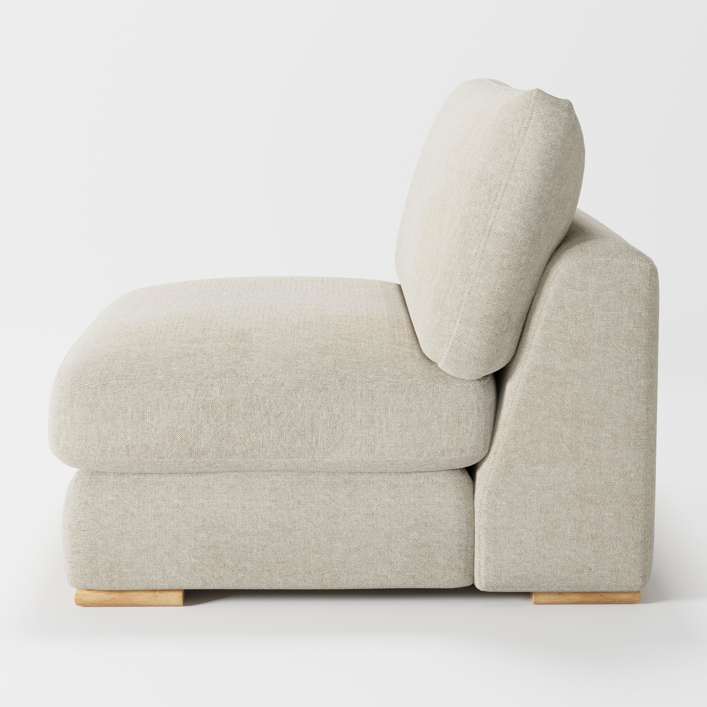 Olton single sofa unit in Alderney Linen Oatmeal shown from the side showing the layered seat cushion and angled back cushion with timber feet.