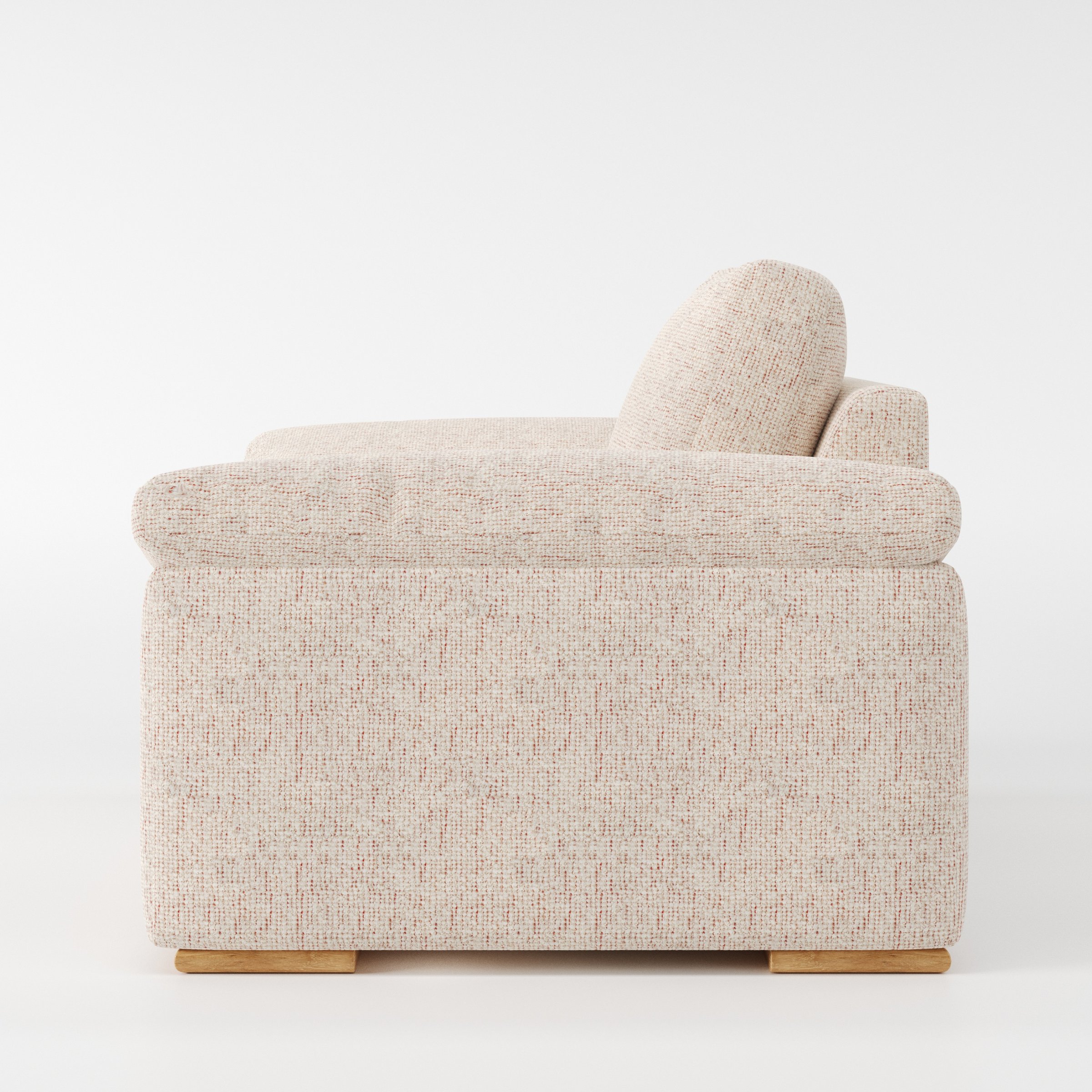 Moy armchair in Orsay Boucle Cream and Copper shown in side profile displaying proportions and overall silhouette.