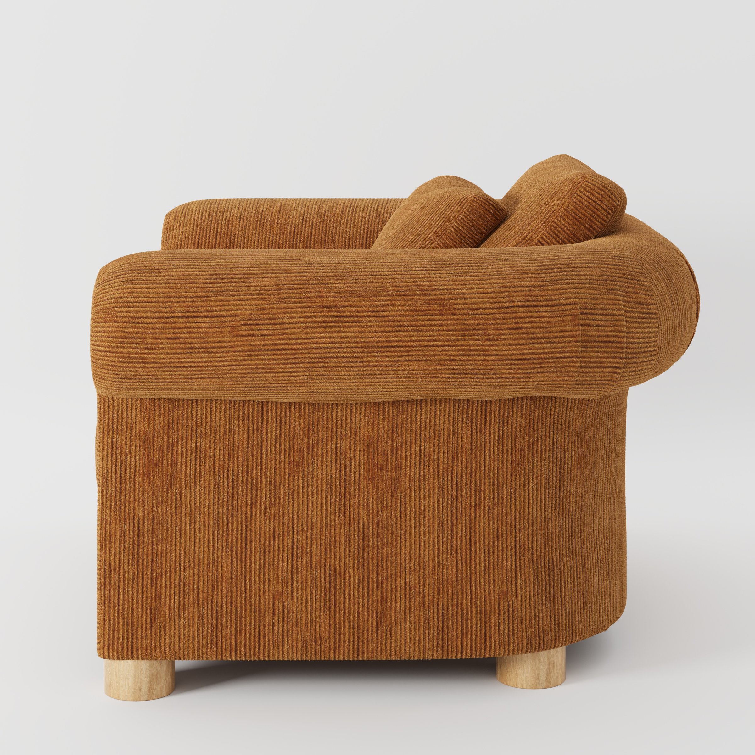 Windermere armchair in Caldey Velvet Corduroy Tobacco shown in side profile displaying proportions and overall silhouette.