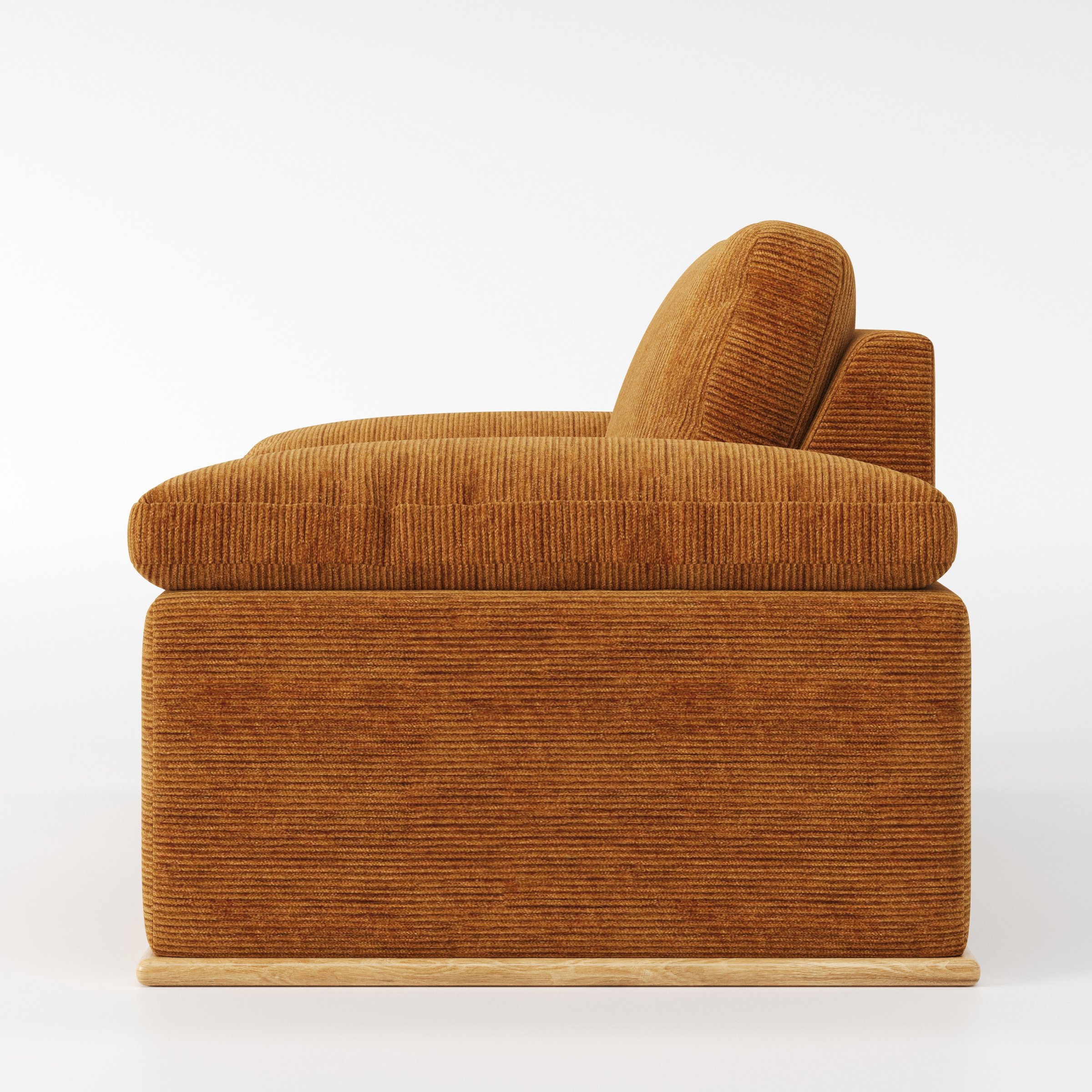 Cusher armchair in Caldey Velvet Corduroy Tobacco shown in side profile displaying proportions and overall silhouette.
