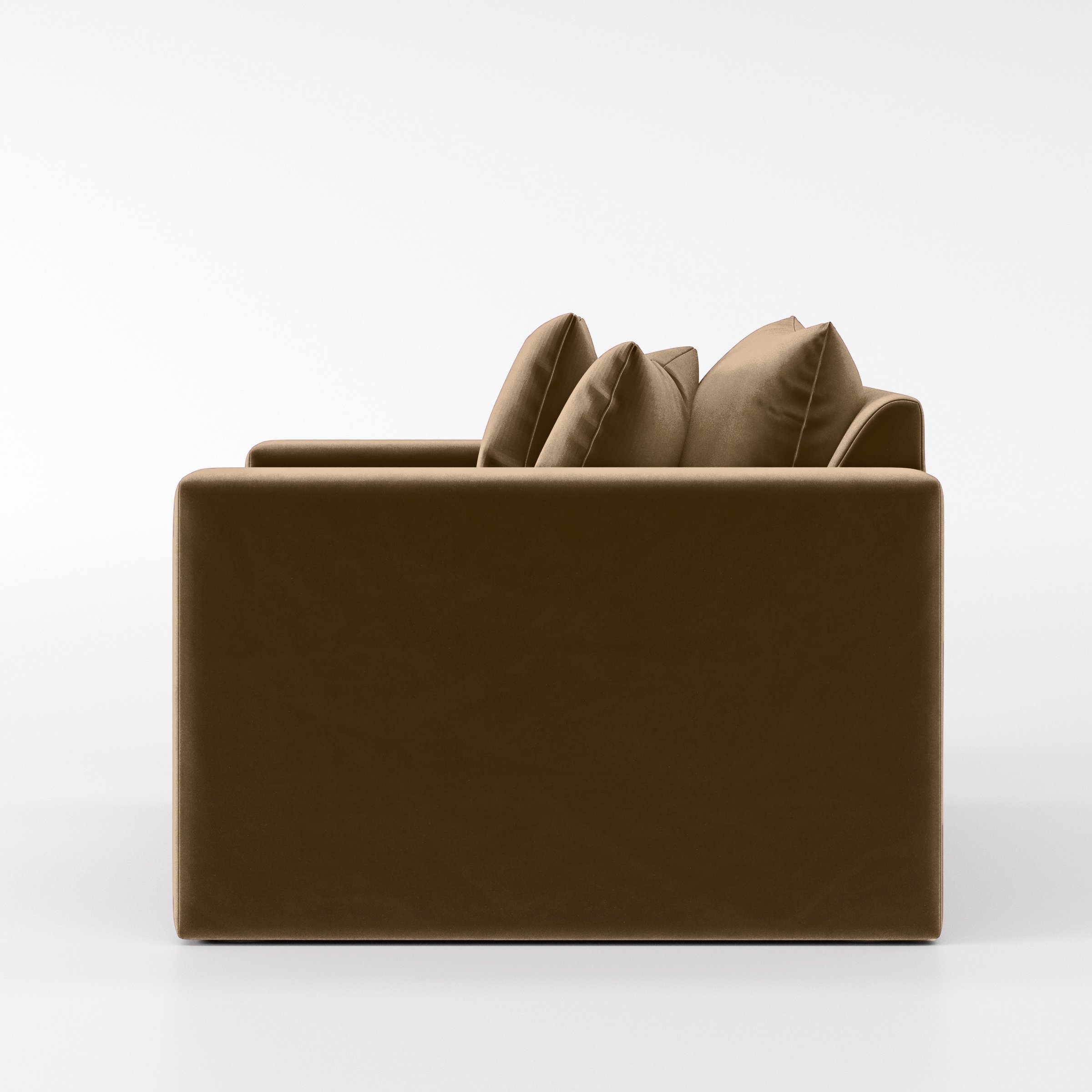Side view of the Coniston armchair upholstered in Plush EasyClean Velvet in Caribou.