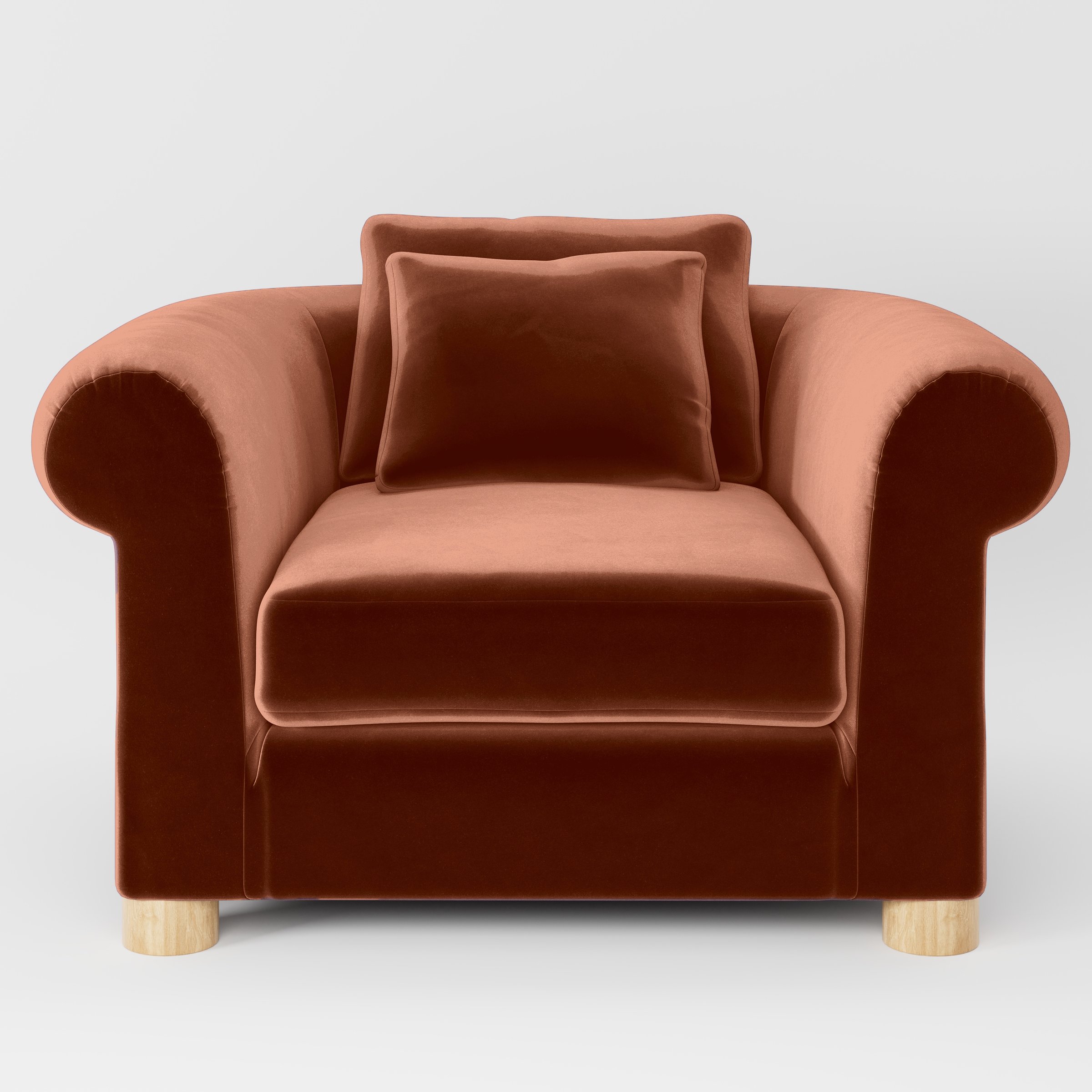 Front view of the Windermere armchair upholstered in Plush EasyClean Velvet in Apricot.