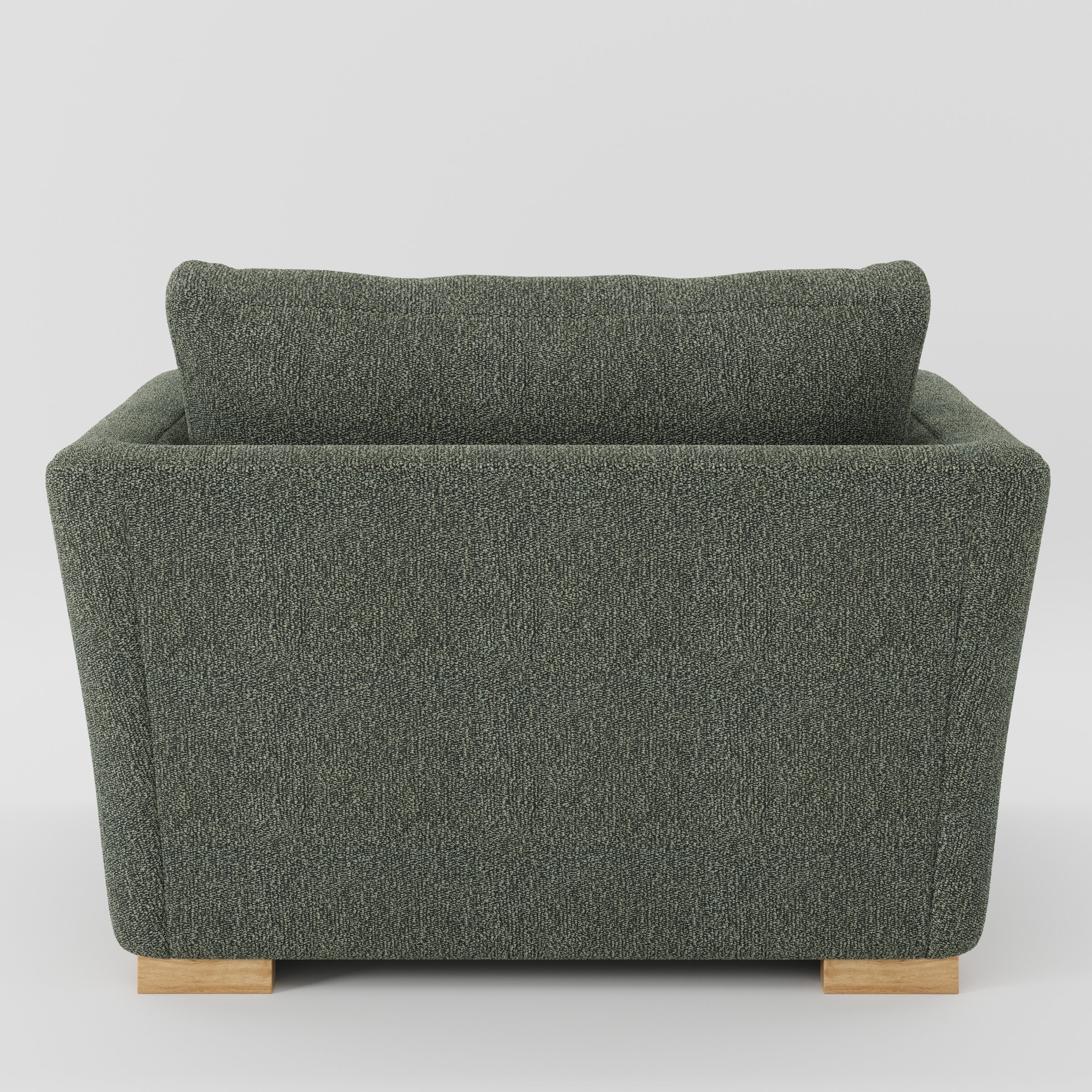 Stowe armchair in Kilda Boucle Moss shown from the rear highlighting backrest shape and upholstery finish.