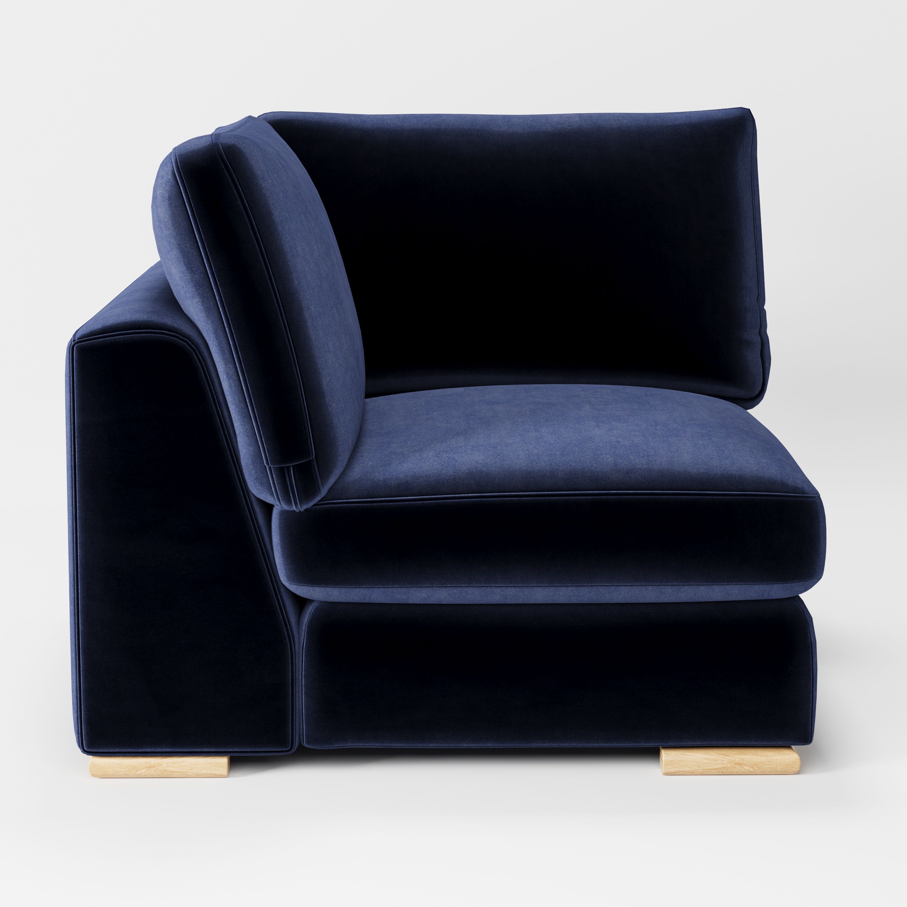 Olton corner unit in Noss velvet navy fabric, left side view showing structured arm and smooth finish