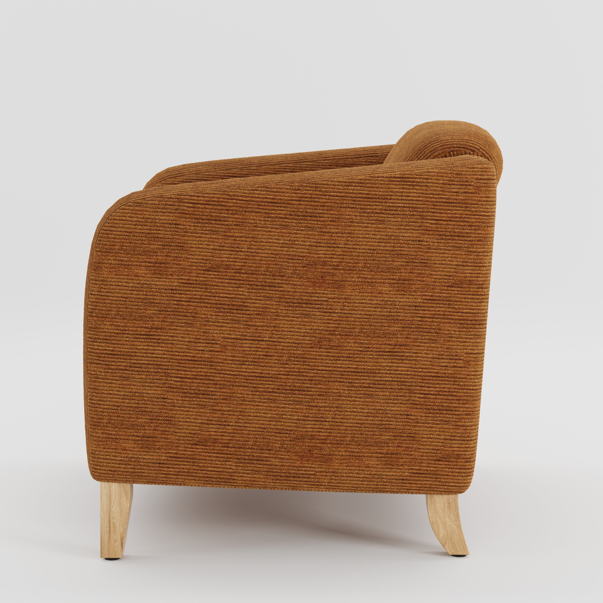 Erne armchair in Caldey Velvet Corduroy Tobacco shown in side profile displaying proportions and overall silhouette.