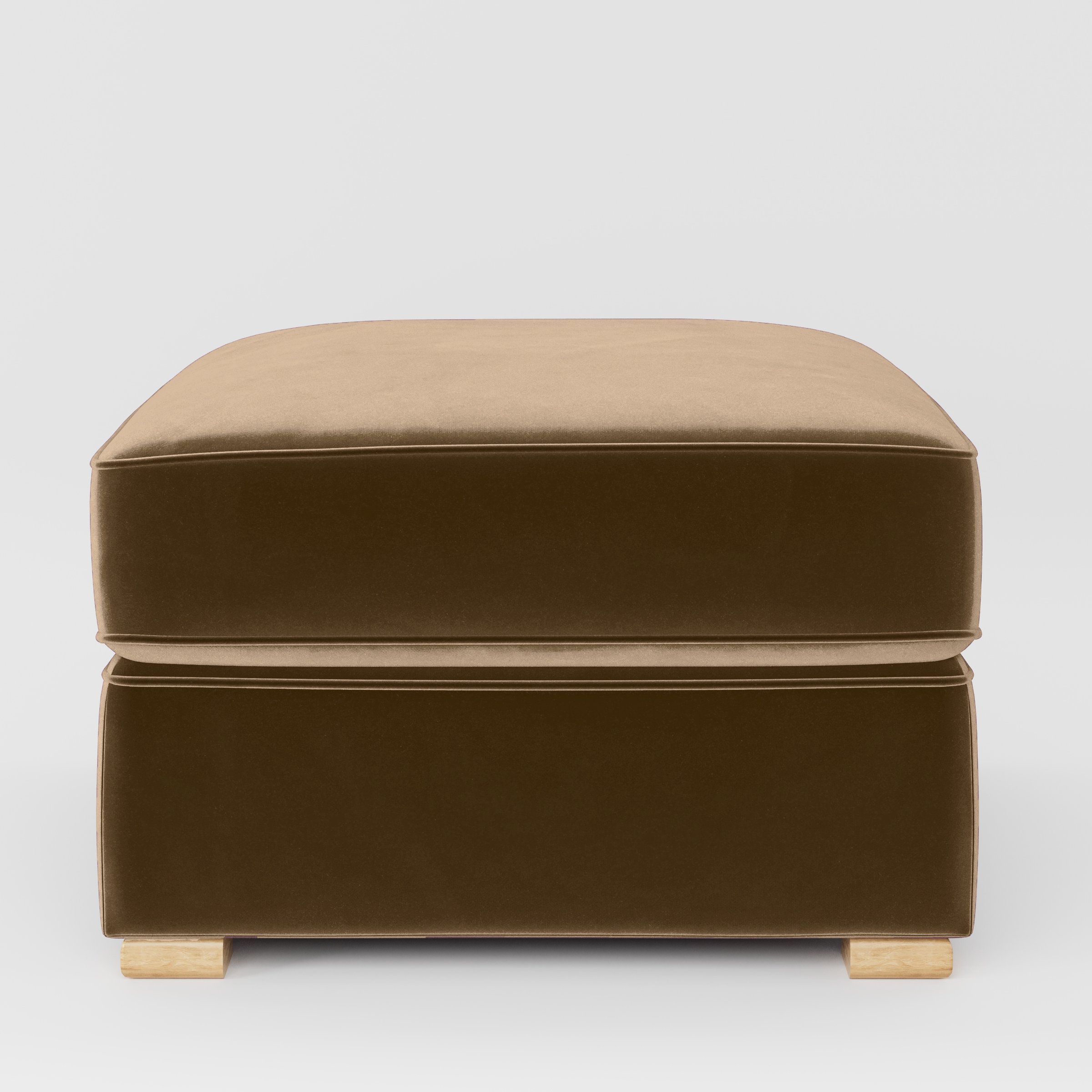 Front view of the Cashel footstool upholstered in Plush EasyClean Velvet in Caribou.