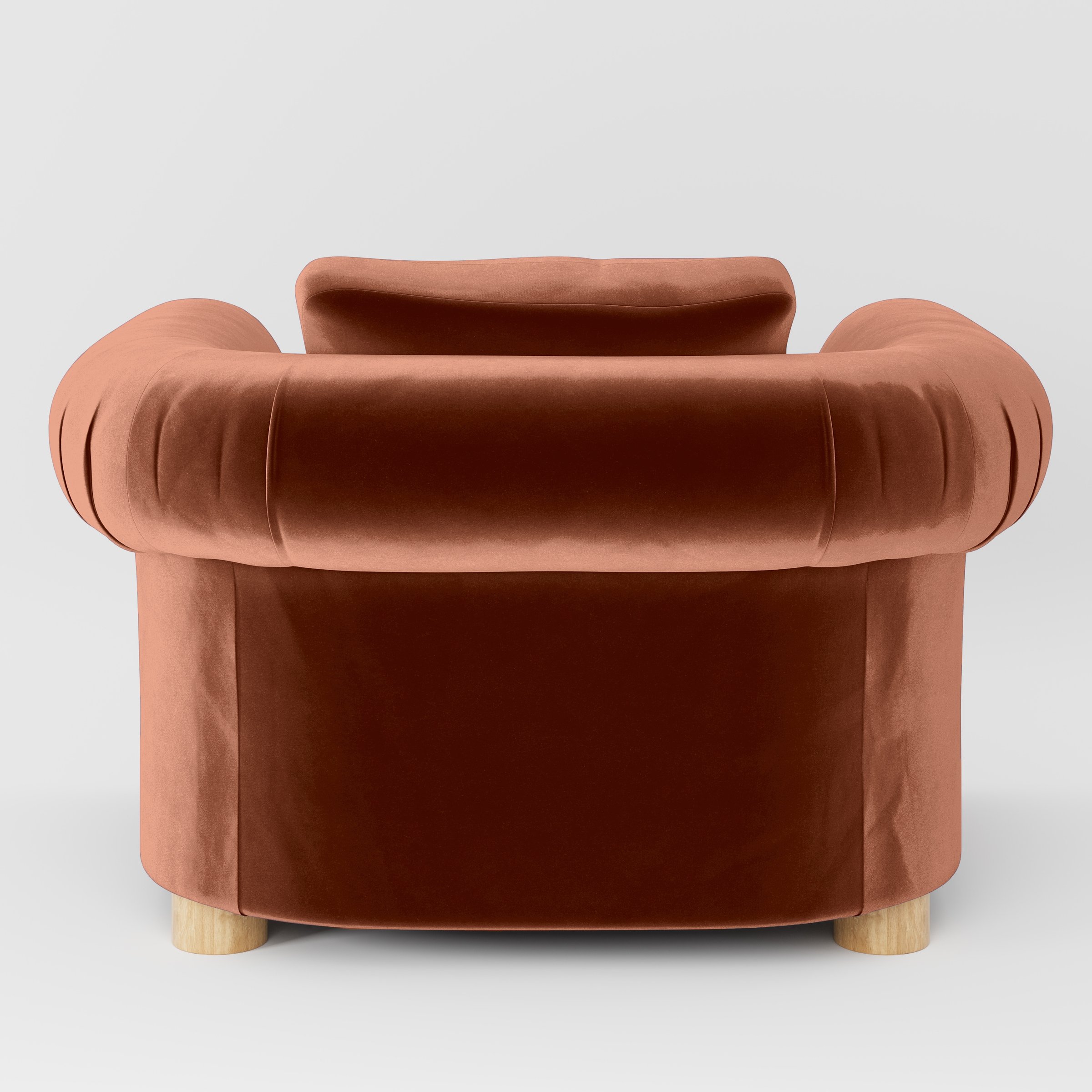Rear view of the Windermere armchair upholstered in Plush EasyClean Velvet in Apricot.