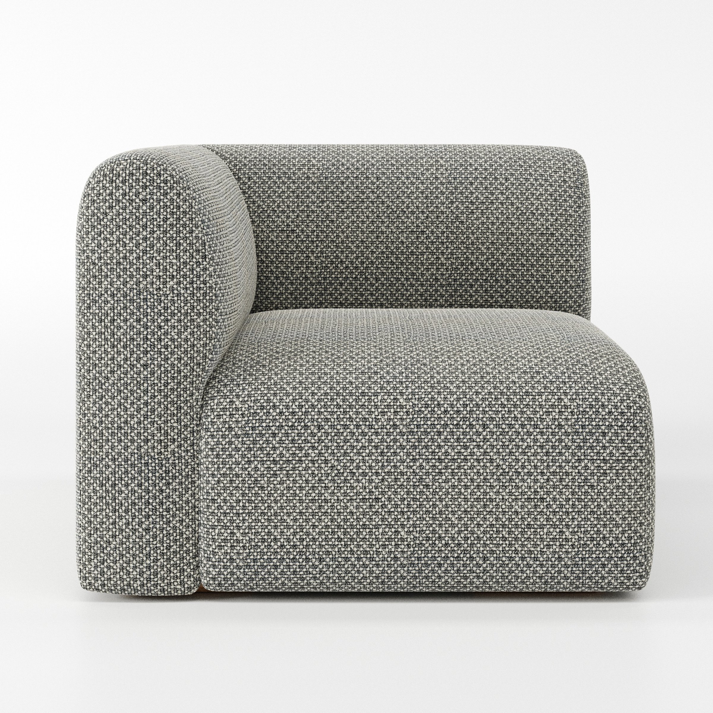 Drumquin modular sofa corner unit in Rousay Wool Blend Tar and Chalk shown from the left highlighting the wraparound back and soft, sculpted form.